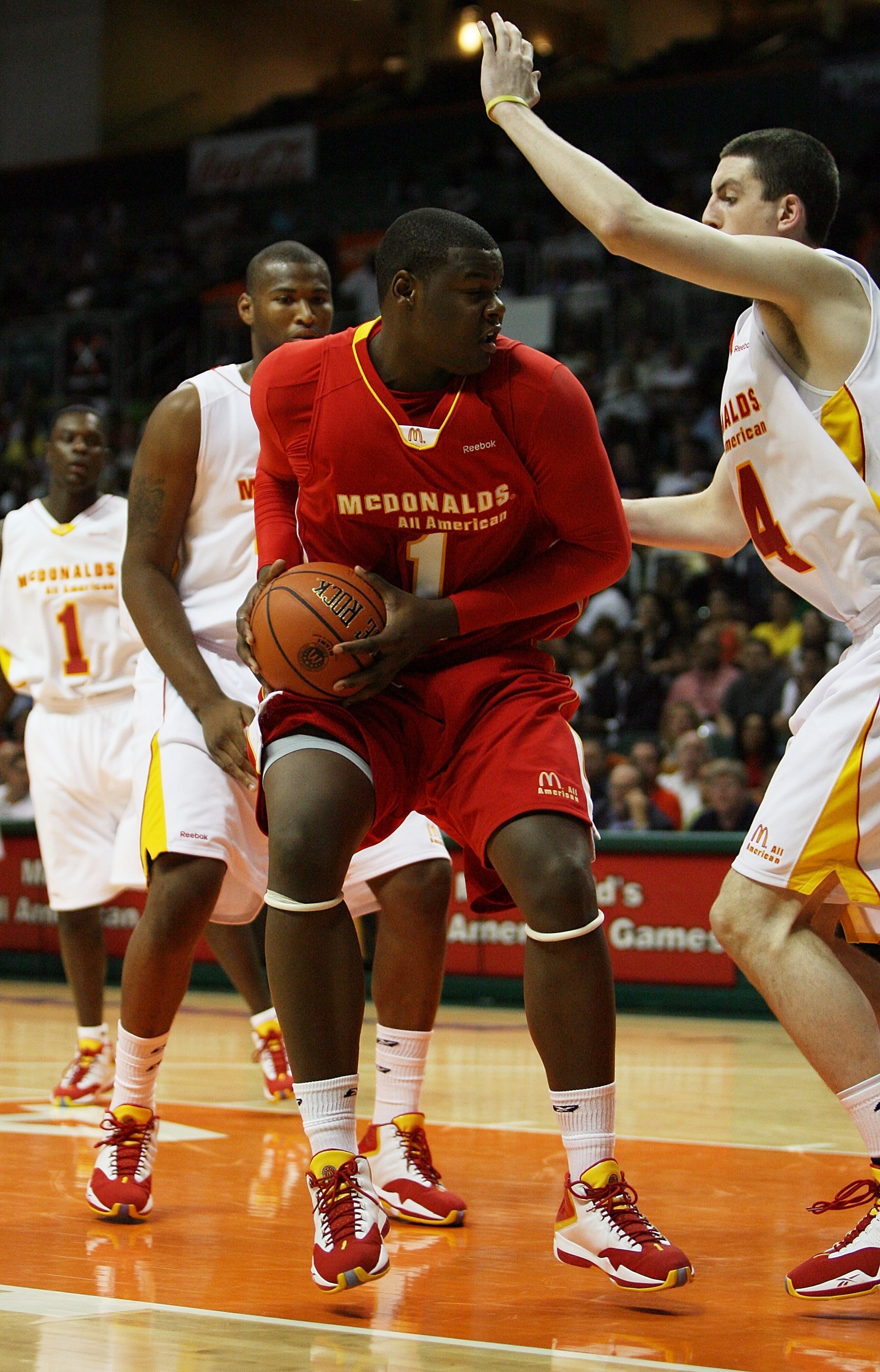 CORAL GABLES, FL - APRIL 01:  Renardo Sidney Jr. #1 of the West Team looks to shoot over Ryan Kelly #4 of the East Team in the 2009 McDonald's All American Men's High School Basketball Game at BankUnited Center on April 1, 2009 in Coral Gables, Florida.