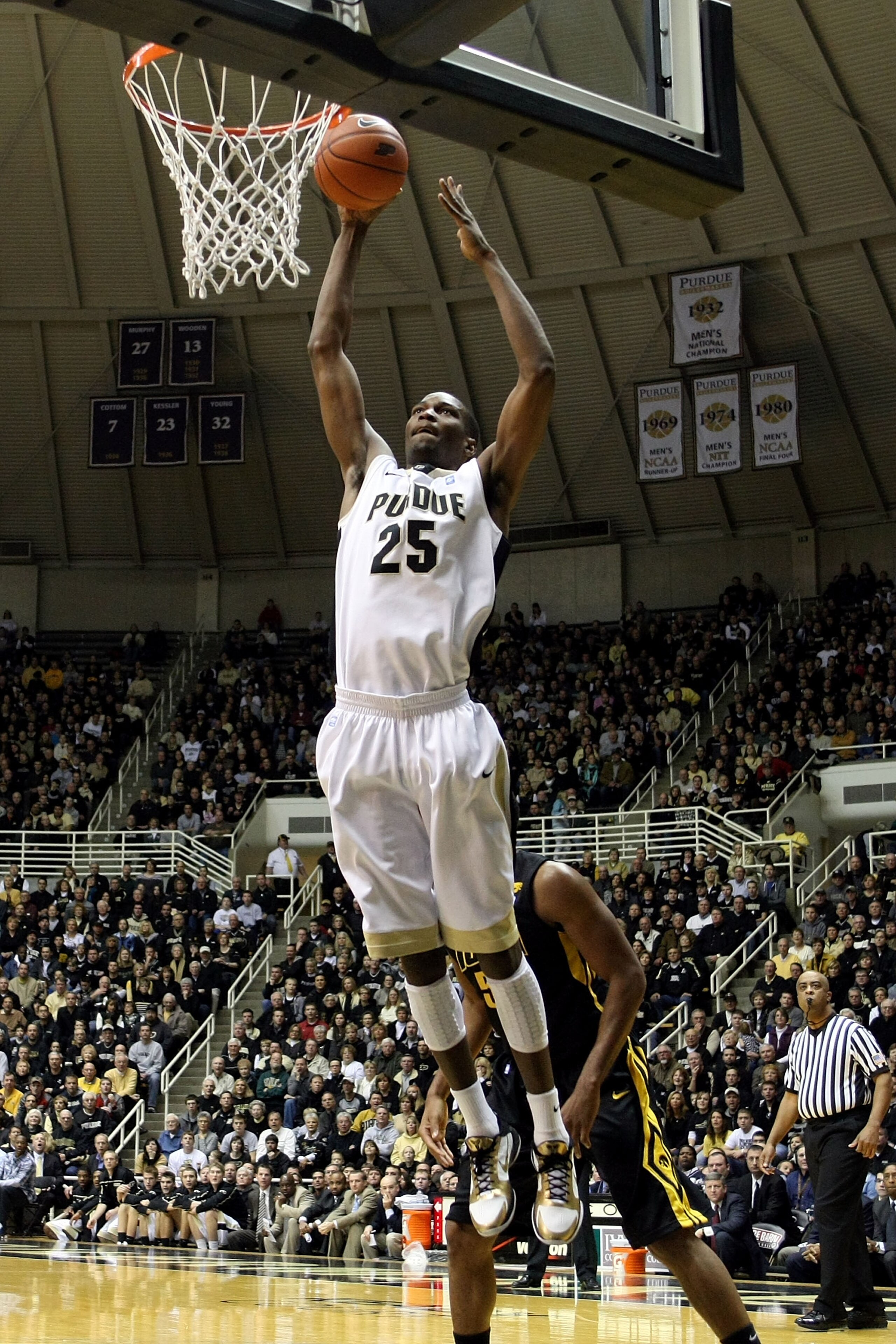 WEST LAFAYETTE, IN - JANUARY 09:  JaJuan Johnson #25 of the Purdue Boilermakers dunks in the first half against the Iowa Hawkeyes at Mackey Arena on January 9, 2011 in West Lafayette, Indiana.  (Photo by Chris Chambers/Getty Images)