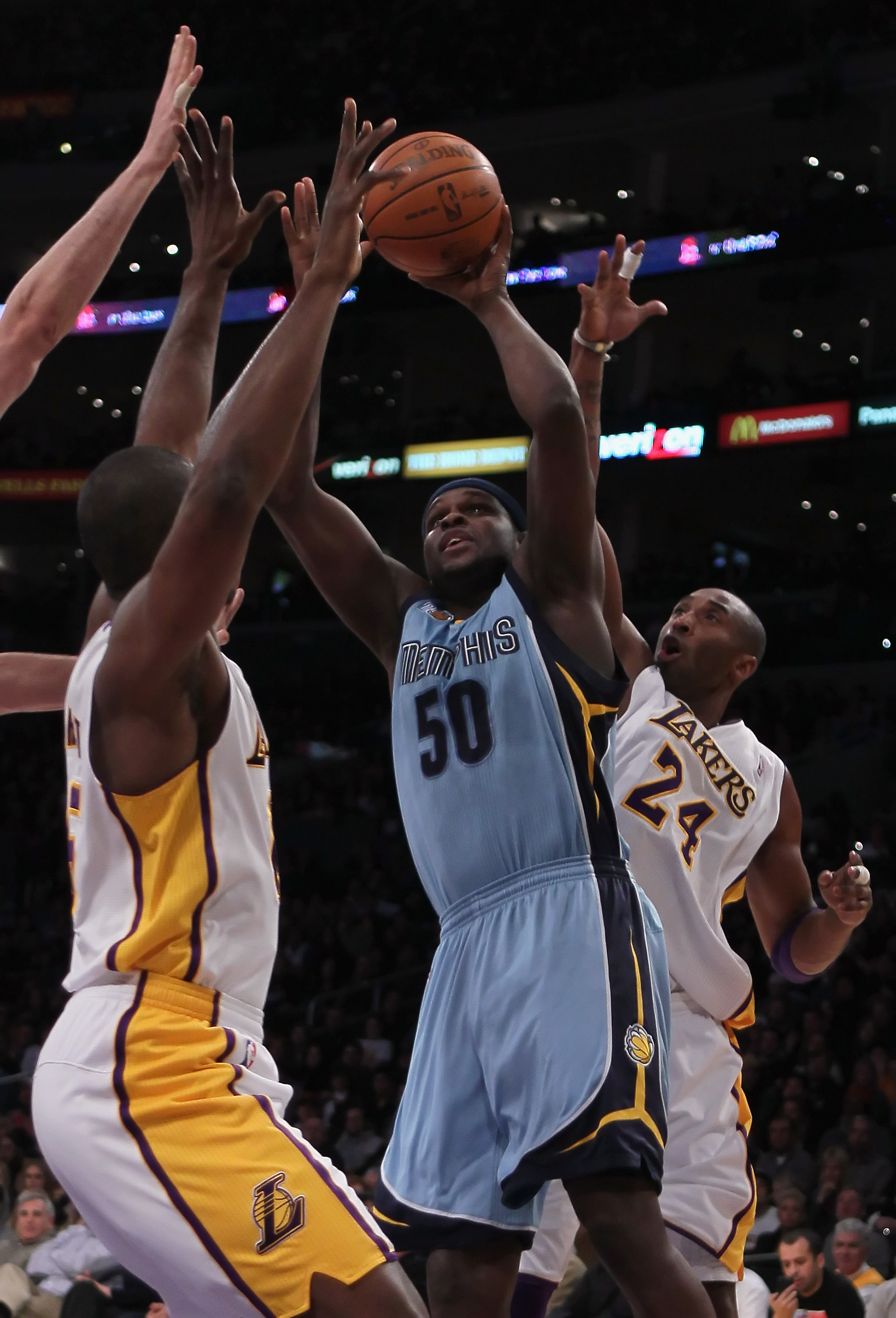 LOS ANGELES, CA - JANUARY 02:  Zach Randolph #50 of the Memphis Grizzlies is defended by Ron Artest (L) #15 and Kobe Bryant #24 of the Los Angeles Lakers during the first half at Staples Center on January 2, 2011 in Los Angeles, California. NOTE TO USER: