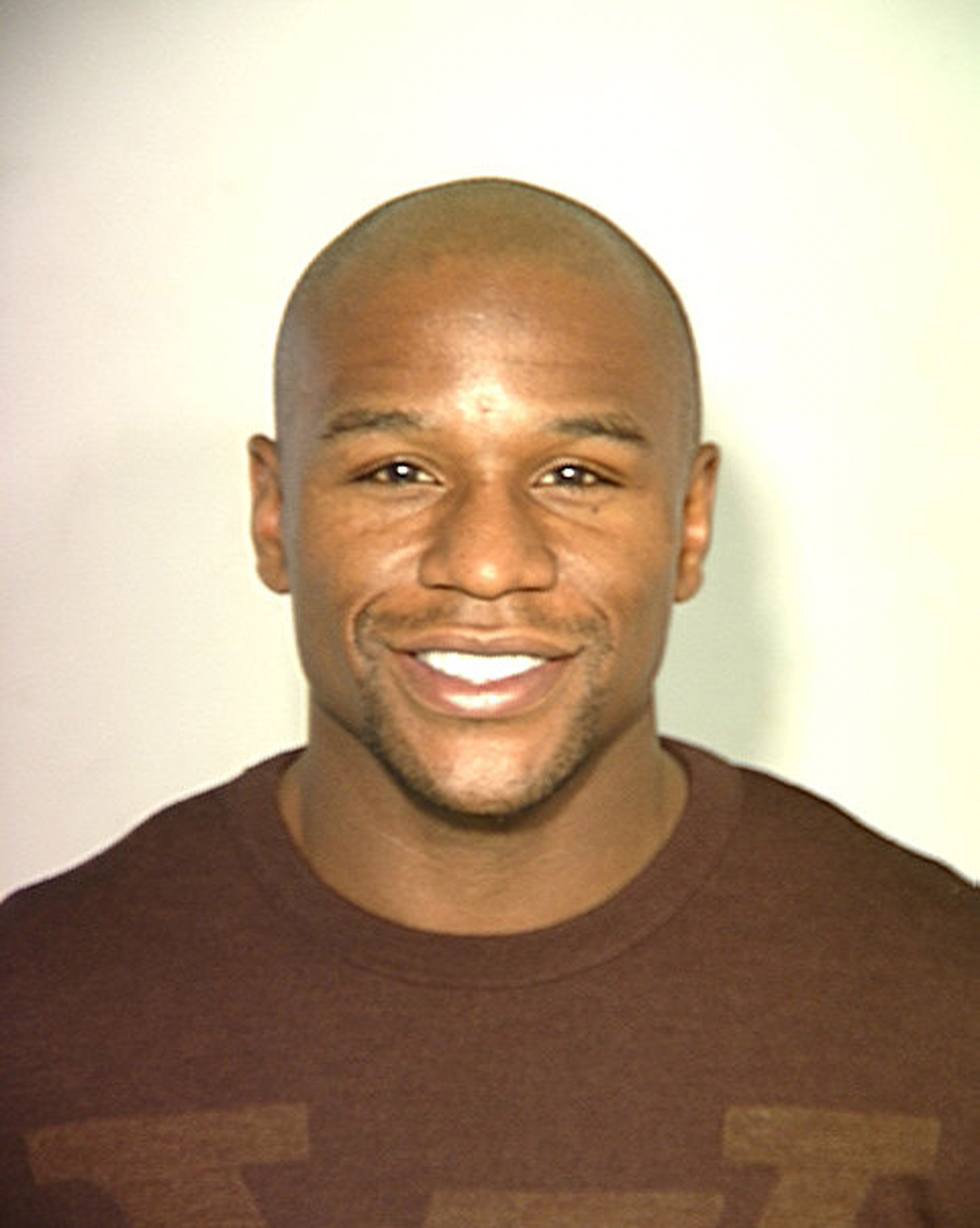 LAS VEGAS, NV - UNDATED: In this handout provided by the Las Vegas Police Department, boxer Floyd Mayweather Jr. poses for a mug shot in Las Vegas, Nevada. Mayweather was arrested for a misdemeanor battery warrant December 16, 2010 at a casino on the Las 