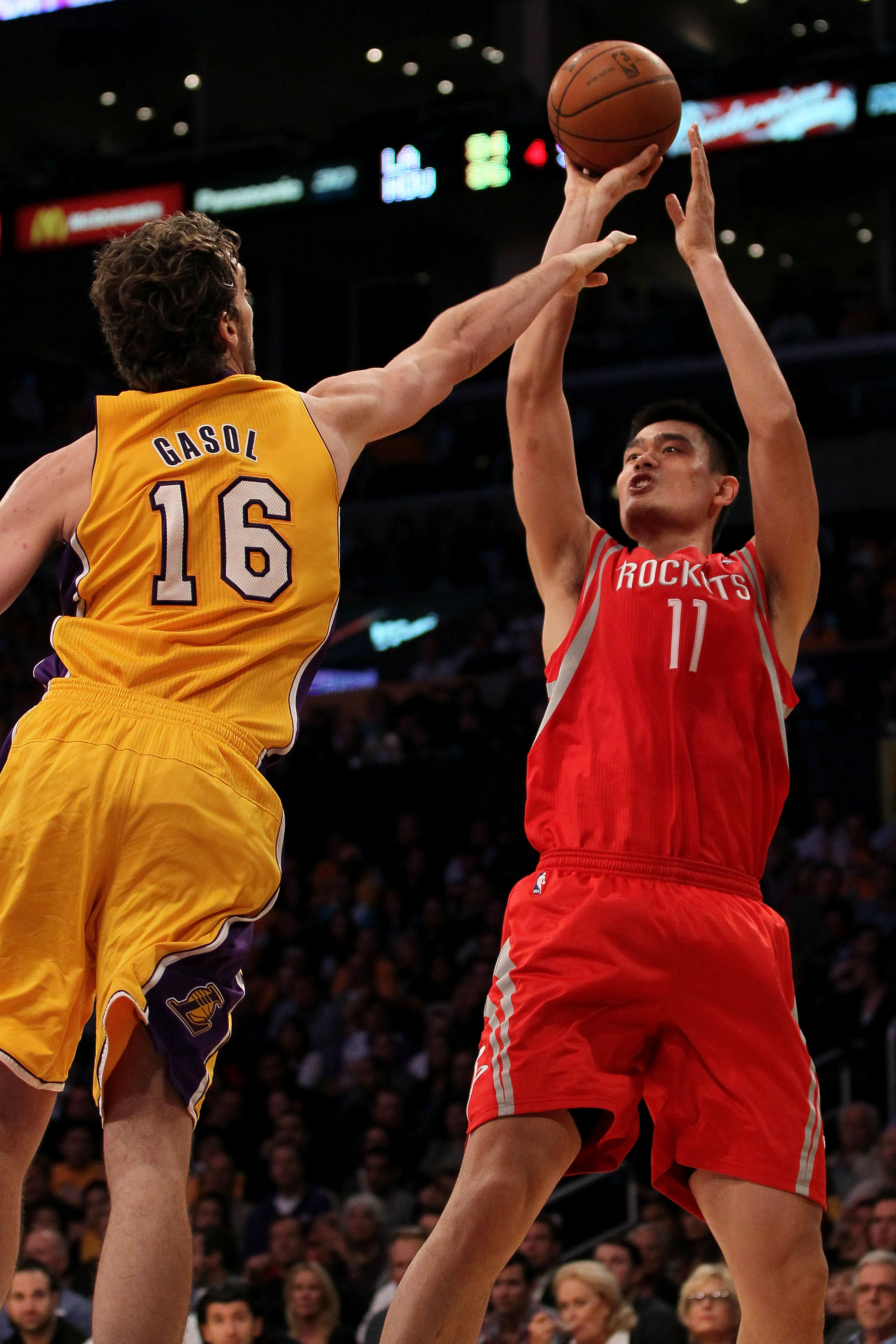 LOS ANGELES, CA - OCTOBER 26:  Yao Ming #11 of the Houston Rockets takes a shot against the Los Angeles Lakers during their game at Staples Center on October 26, 2010 in Los Angeles, California. NOTE TO USER: User expressly acknowledges and agrees that, b