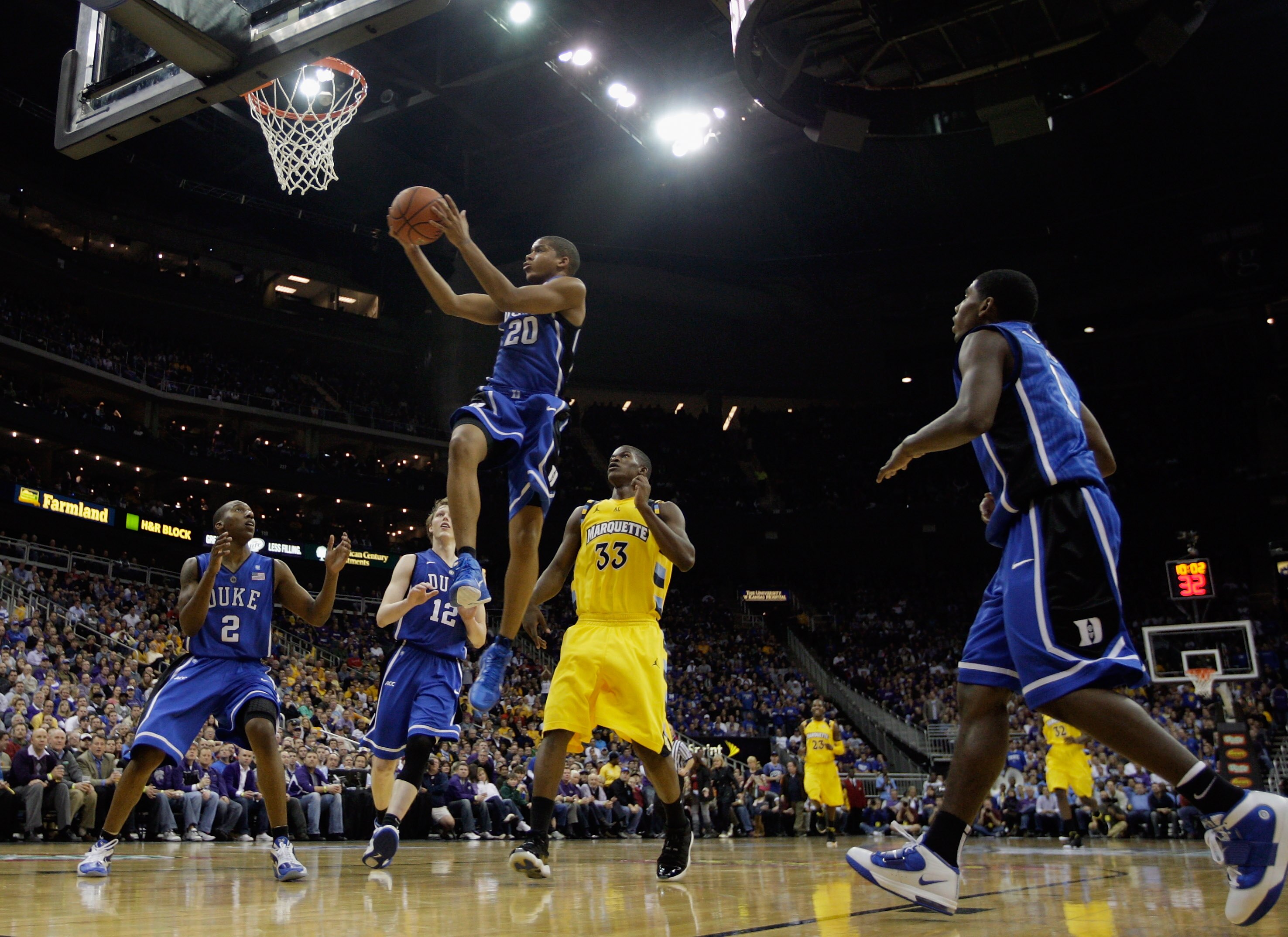 KANSAS CITY, MO - NOVEMBER 22:  Andre Dawkins #20 of the Duke Blue Devils in action during the CBE Classic game against the Marquette Golden Eagles on November 22, 2010 at the Sprint Center in Kansas City, Missouri.  (Photo by Jamie Squire/Getty Images)