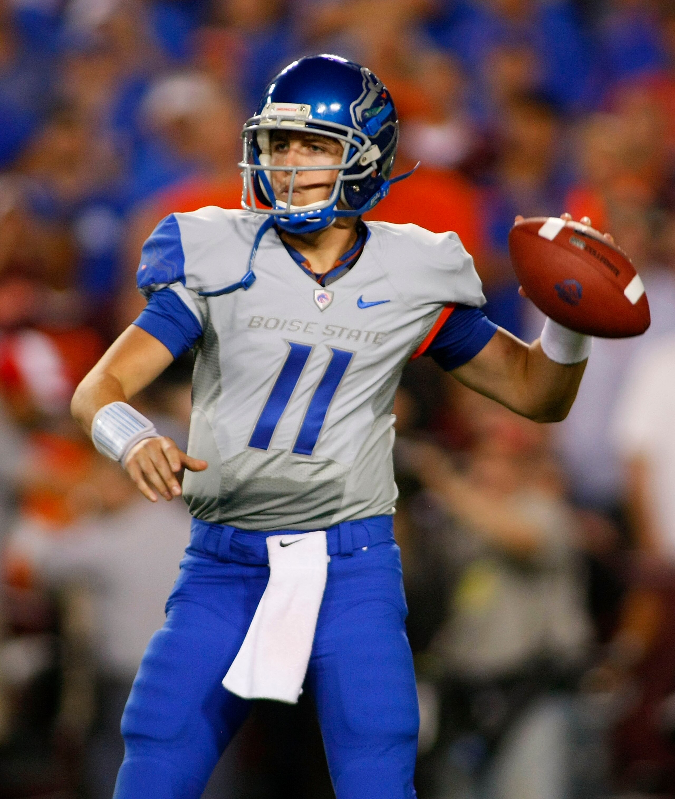 LANDOVER, MD - SEPTEMBER 06:  Quarterback Kellen Moore #11 of the Boise State Broncos passes against the Virginia Tech Hokies at FedExField on September 6, 2010 in Landover, Maryland.  (Photo by Geoff Burke/Getty Images)