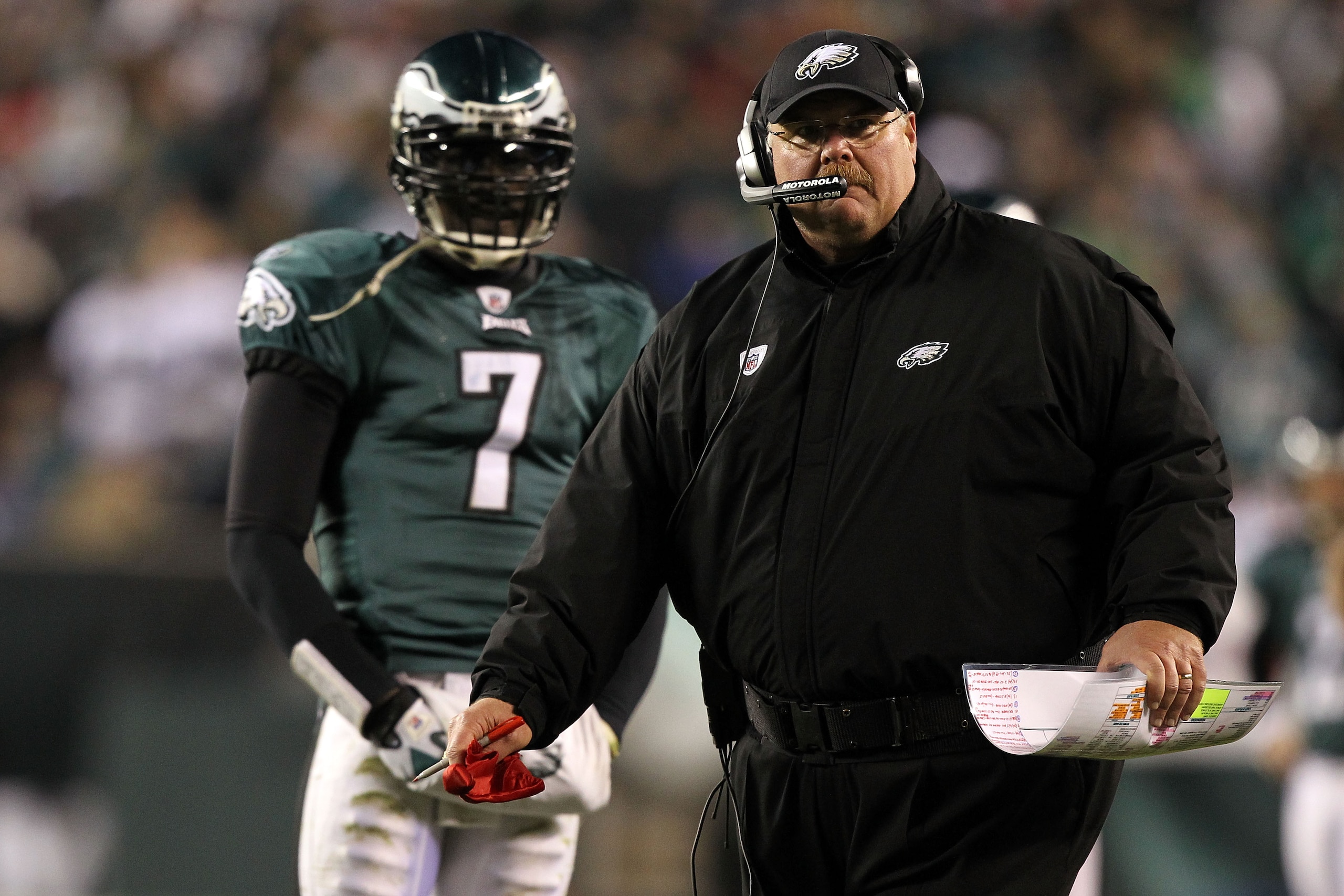 PHILADELPHIA, PA - DECEMBER 02: Head coach Andy Reid of the Philadelphia Eagles throws the red challenge flag on a play involving Brent Celek #87 in the second half as Michael Vick #7 looks on against the Houston Texans at Lincoln Financial Field on Dece PHILADELPHIA, PA - DECEMBER 02: Head coach Andy Reid of the Philadelphia Eagles throws the red challenge flag on a play involving Brent Celek #87 in the second half as Michael Vick #7 looks on against the Houston Texans at Lincoln Financial Field on Dece