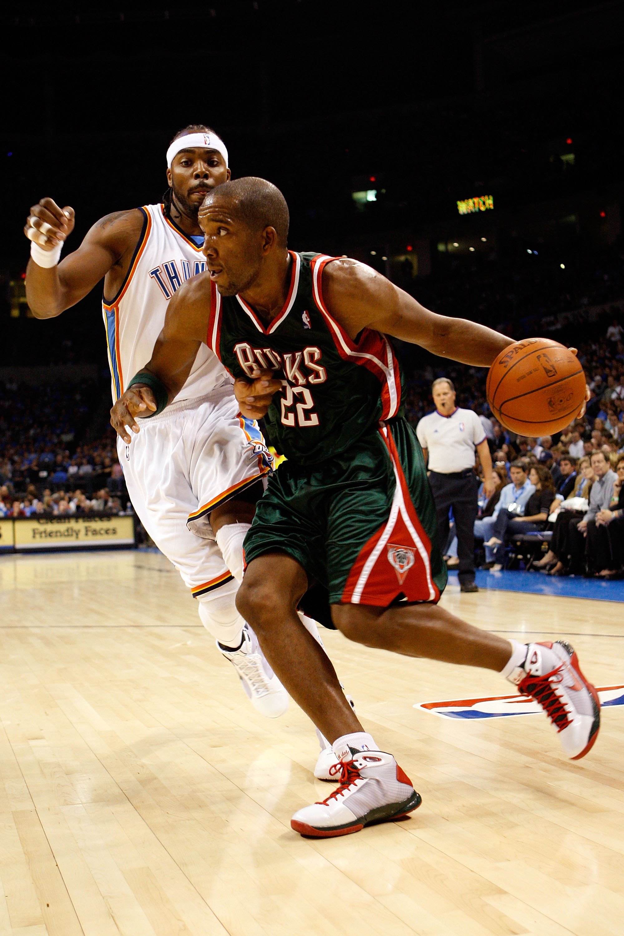 OKLAHOMA CITY - OCTOBER 29:  Michael Redd #22 of the Milwaukee Bucks drives to the basket past Chris Wilcox #54 of the Oklahoma City Thunder at the Ford Center on October 29, 2008 in Oklahoma City, Oklahoma. The Bucks won 98-87.  NOTE TO USER: User expres