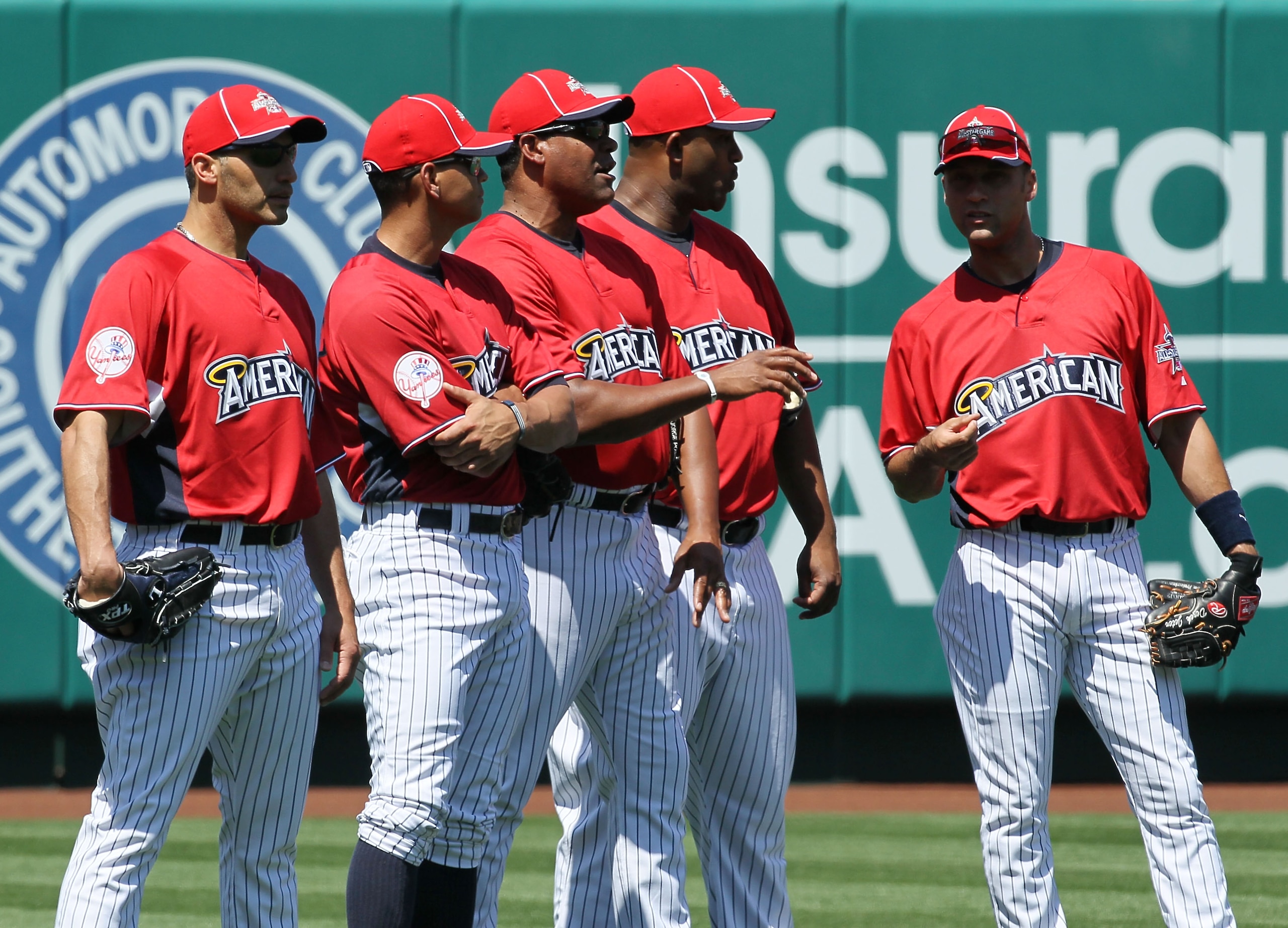 ANAHEIM, CA - JULY 12:  (L-R) American League All-Star Andy Pettitte #46 of the New York Yankees stands with teammates Alex Rodriguez #13, bullpen coach Mike Harkey, CC Sabathia #52, and Derek Jeter #2 during Gatorade All-Star Workout Day at Angel Stadium