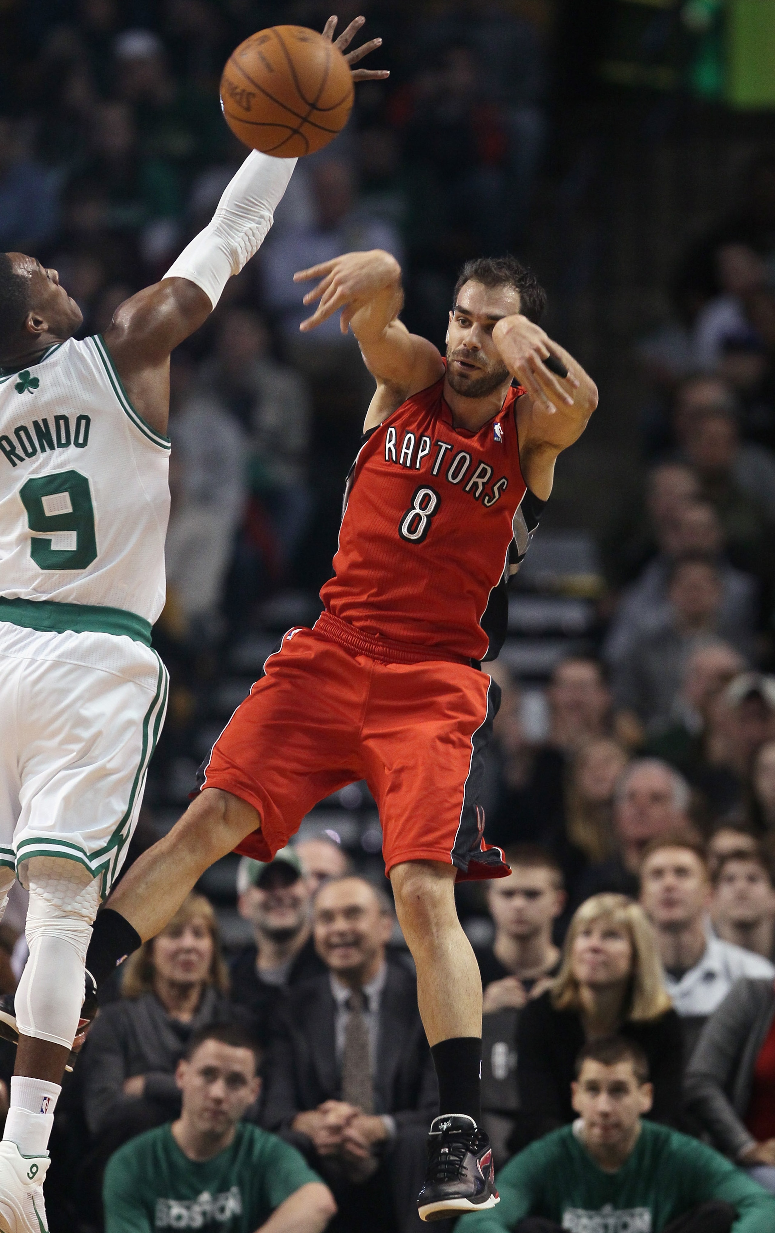 BOSTON, MA - JANUARY 07: Jose Calderon #8 of the Toronto Raptors passes the ball as Rajon Rondo #9 of the Boston Celtics defends on January 7, 2011 at the TD Garden in Boston, Massachusetts. NOTE TO USER: User expressly acknowledges and agrees that, by d BOSTON, MA - JANUARY 07: Jose Calderon #8 of the Toronto Raptors passes the ball as Rajon Rondo #9 of the Boston Celtics defends on January 7, 2011 at the TD Garden in Boston, Massachusetts. NOTE TO USER: User expressly acknowledges and agrees that, by d