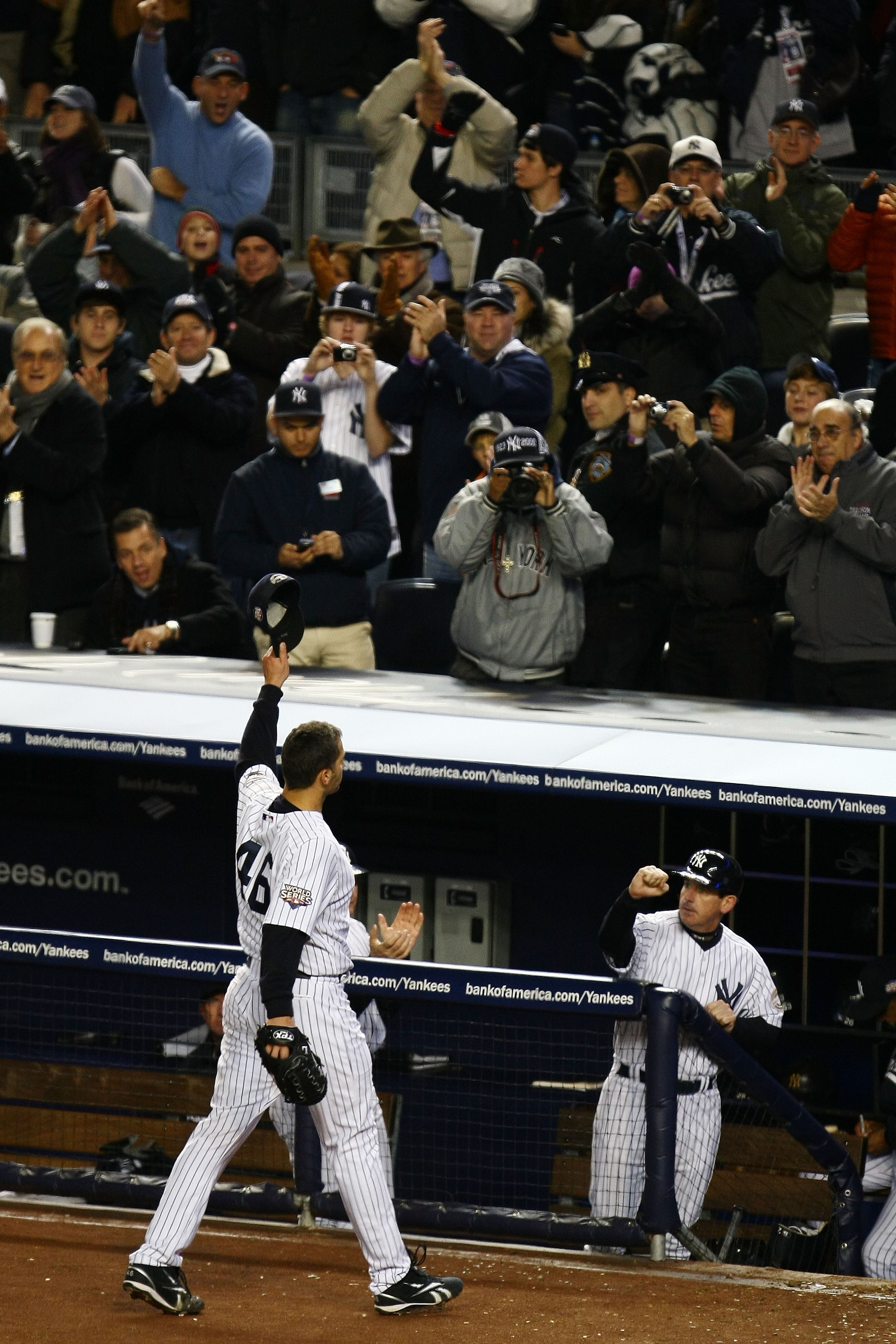 NEW YORK - NOVEMBER 04:  Andy Pettitte #46 of the New York Yankees tips his hat to the crowd as he was taken out of the game in the top of the sixth inning against the Philadelphia Phillies in Game Six of the 2009 MLB World Series at Yankee Stadium on Nov