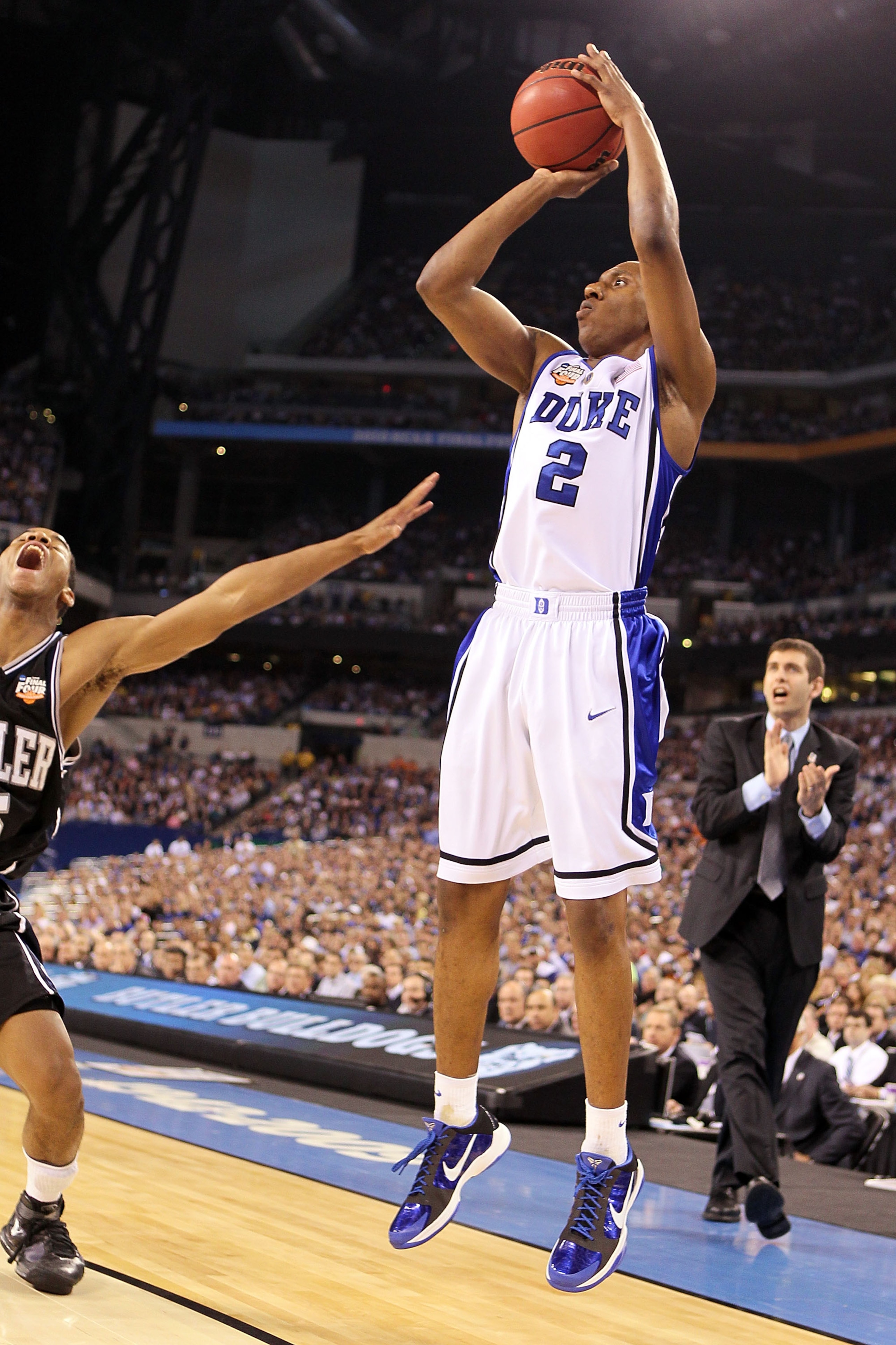 INDIANAPOLIS - APRIL 05:  Nolan Smith #2 of the Duke Blue Devils shoots a three-pointer in the first half against the Butler Bulldogs during the 2010 NCAA Division I Men's Basketball National Championship game at Lucas Oil Stadium on April 5, 2010 in Indi