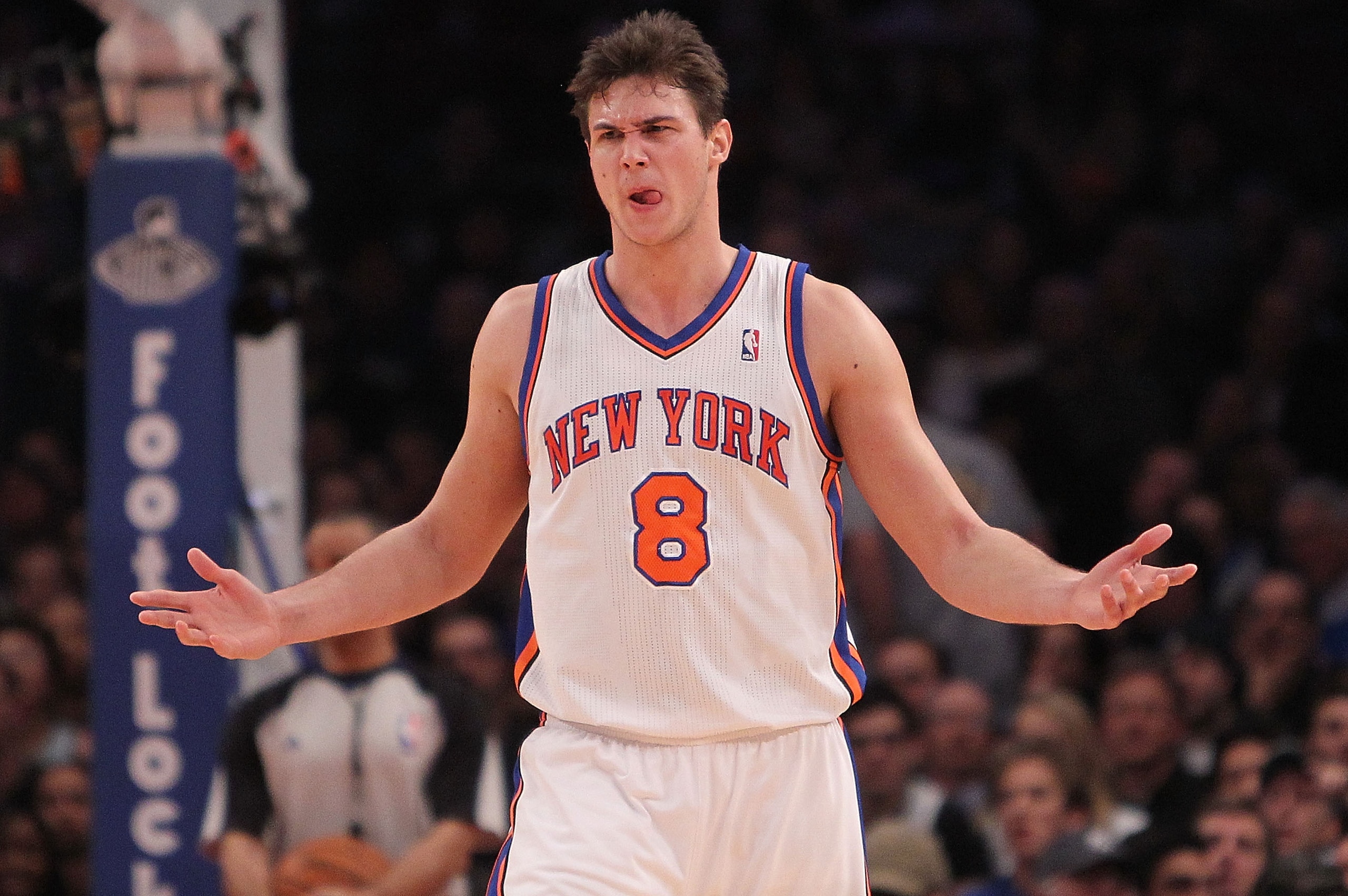 NEW YORK, NY - FEBRUARY 02:  Danilo Gallinari #8 of the New York Knicks questions a call against the Dallas Mavericks at Madison Square Garden on February 2, 2011 in New York City. NOTE TO USER: User expressly acknowledges and agrees that, by downloading