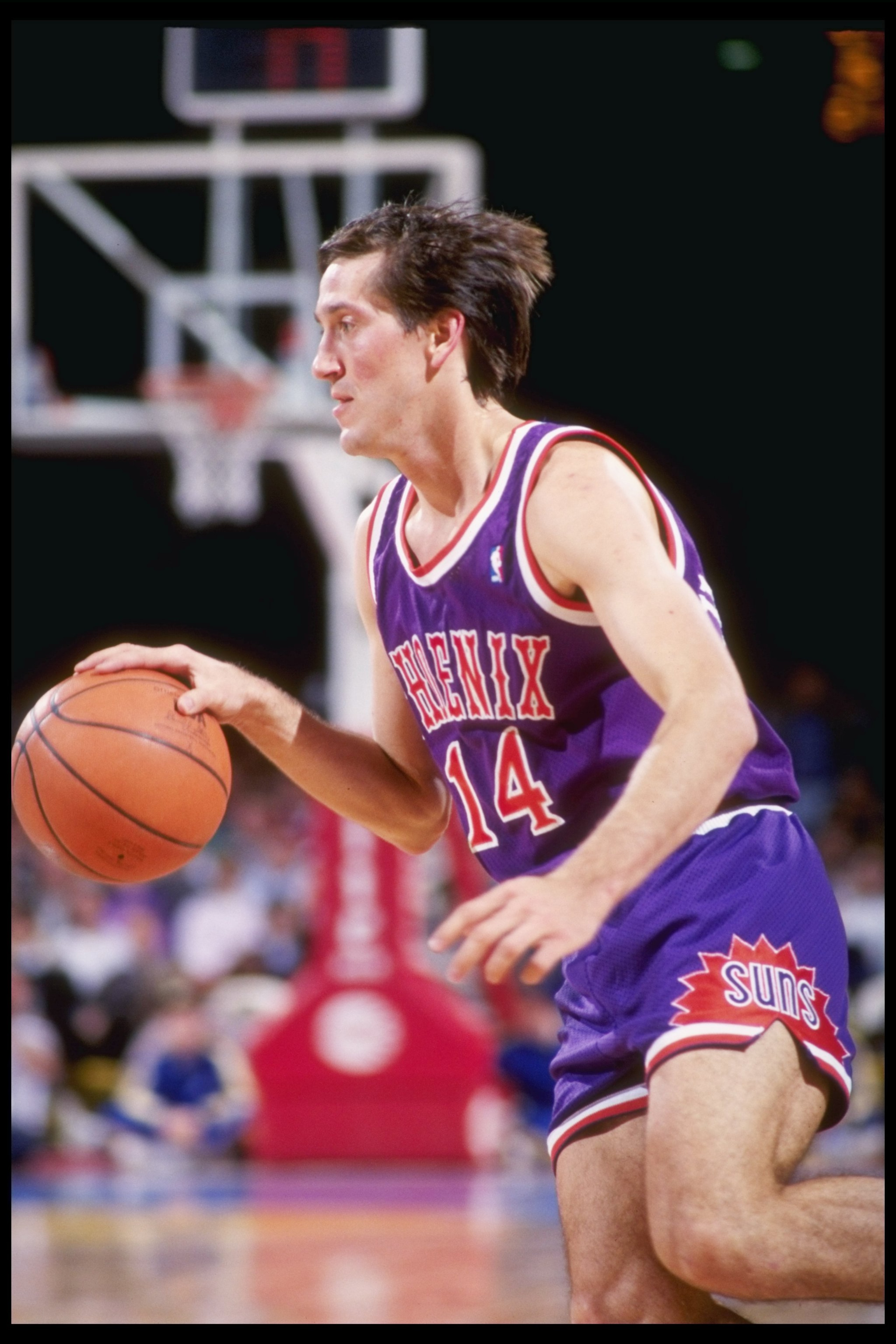 1990-1991:  Guard Jeff Hornacek of the Phoenix Suns moves the ball during a game against the Denver Nuggets at the America West Arena in Phoenix, Arizona. Mandatory Credit: Tim DeFrisco  /Allsport