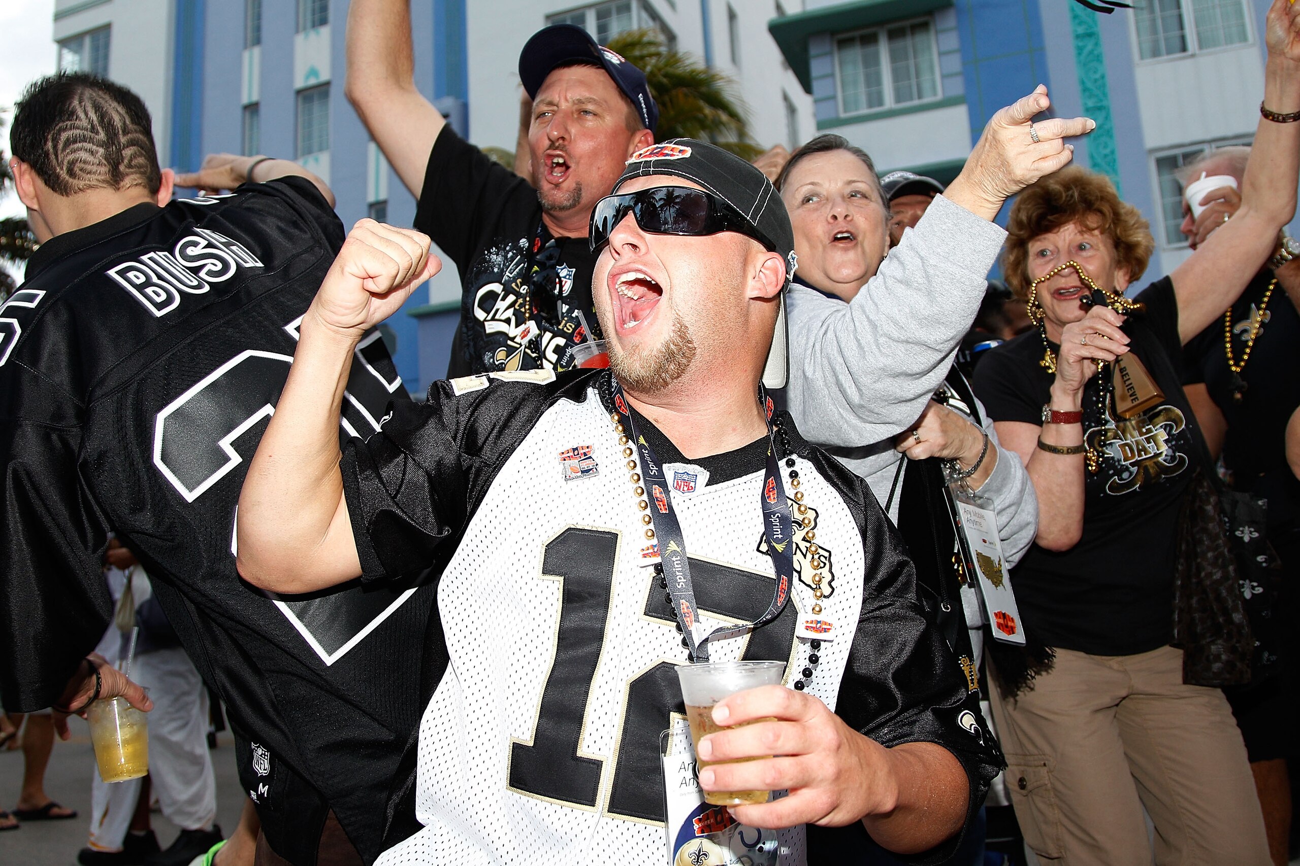 MIAMI - FEBRUARY 05:  Fans of the New Orleans Saints party on South Beach on February 5, 2010 in Miami, Florida.  Super Bowl XLIV between the Indianapolis Colts and the New Orleans Saints will be held Sunday February 7, 2010.  (Photo by Chris Graythen/Get