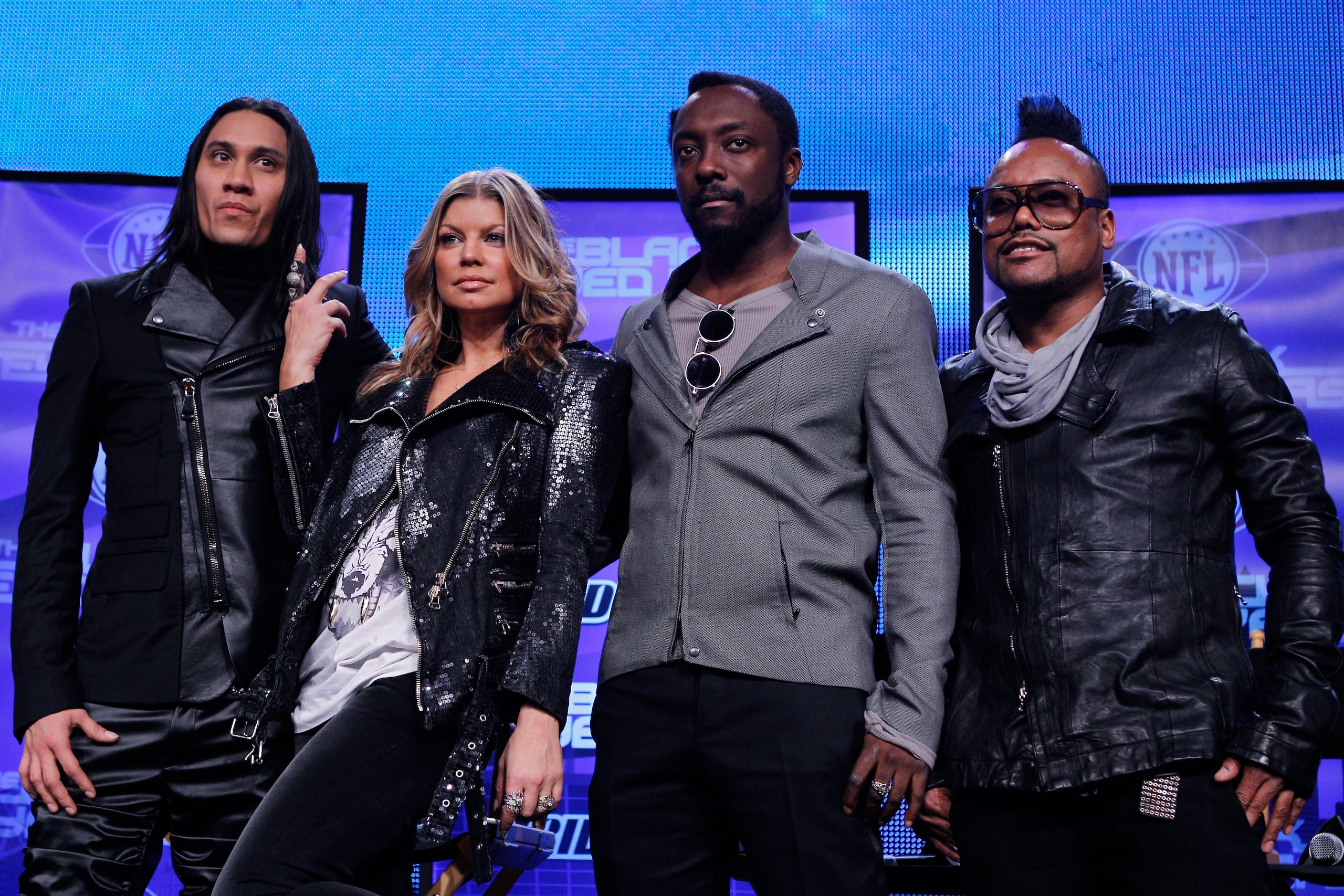 DALLAS, TX - FEBRUARY 03:  (L-R) Taboo, Fergie, will.i.am and apl.de.ap of the Black Eyed Peas attend a press conference at the Super Bowl XLV media center on February 3, 2011 in Dallas, Texas. The Black Eyed Peas will perform during the Bridgestone Super