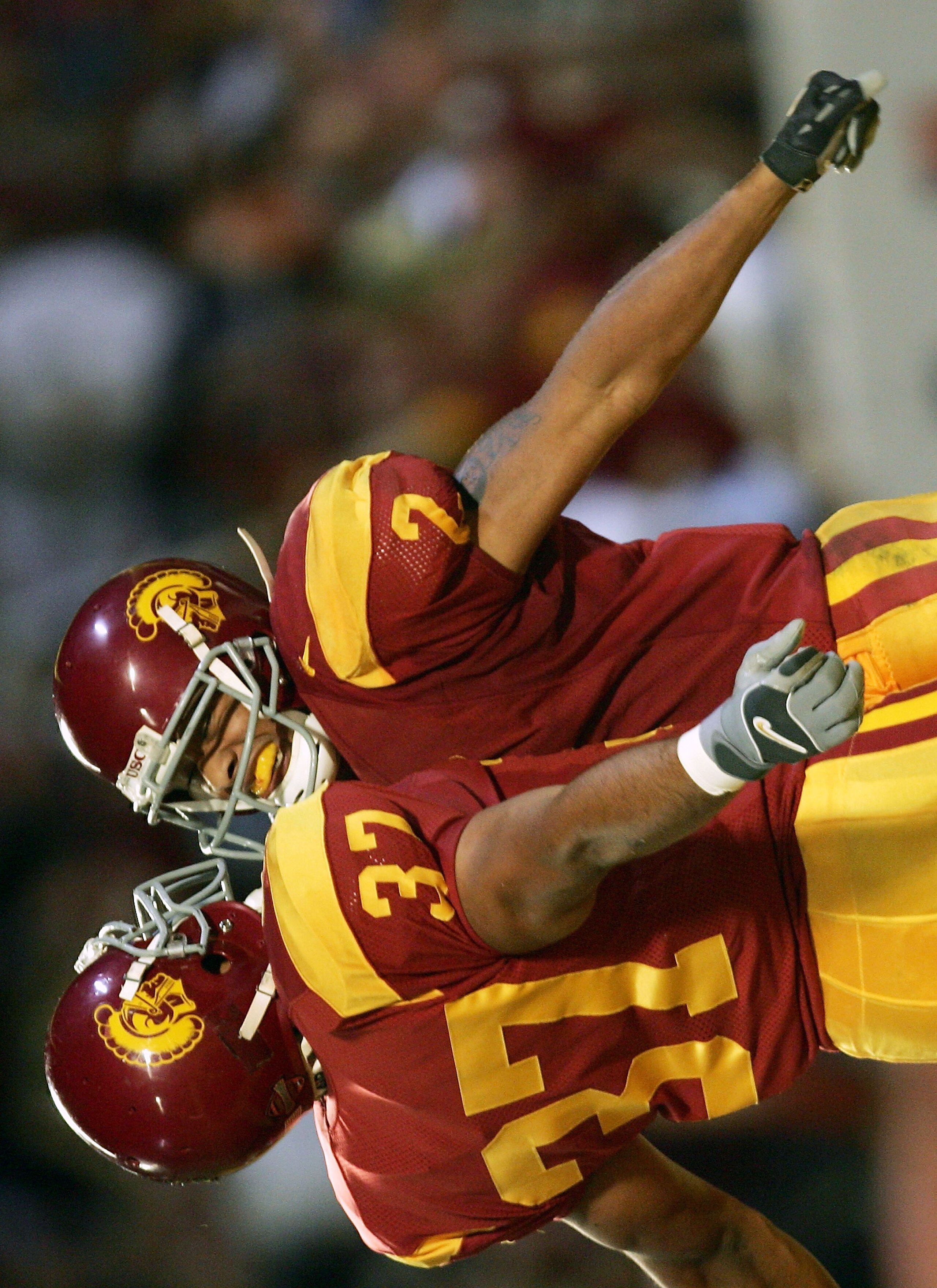 MIAMI - JANUARY 4:  Wide receiver Steve Smith #2 of the USC Trojans celebrates with teammate David Kirtman #37 after catching a 5-yard touchdown pass against the Oklahoma Sooners in the second quarter during the FedEx Orange Bowl 2005 National Championshi