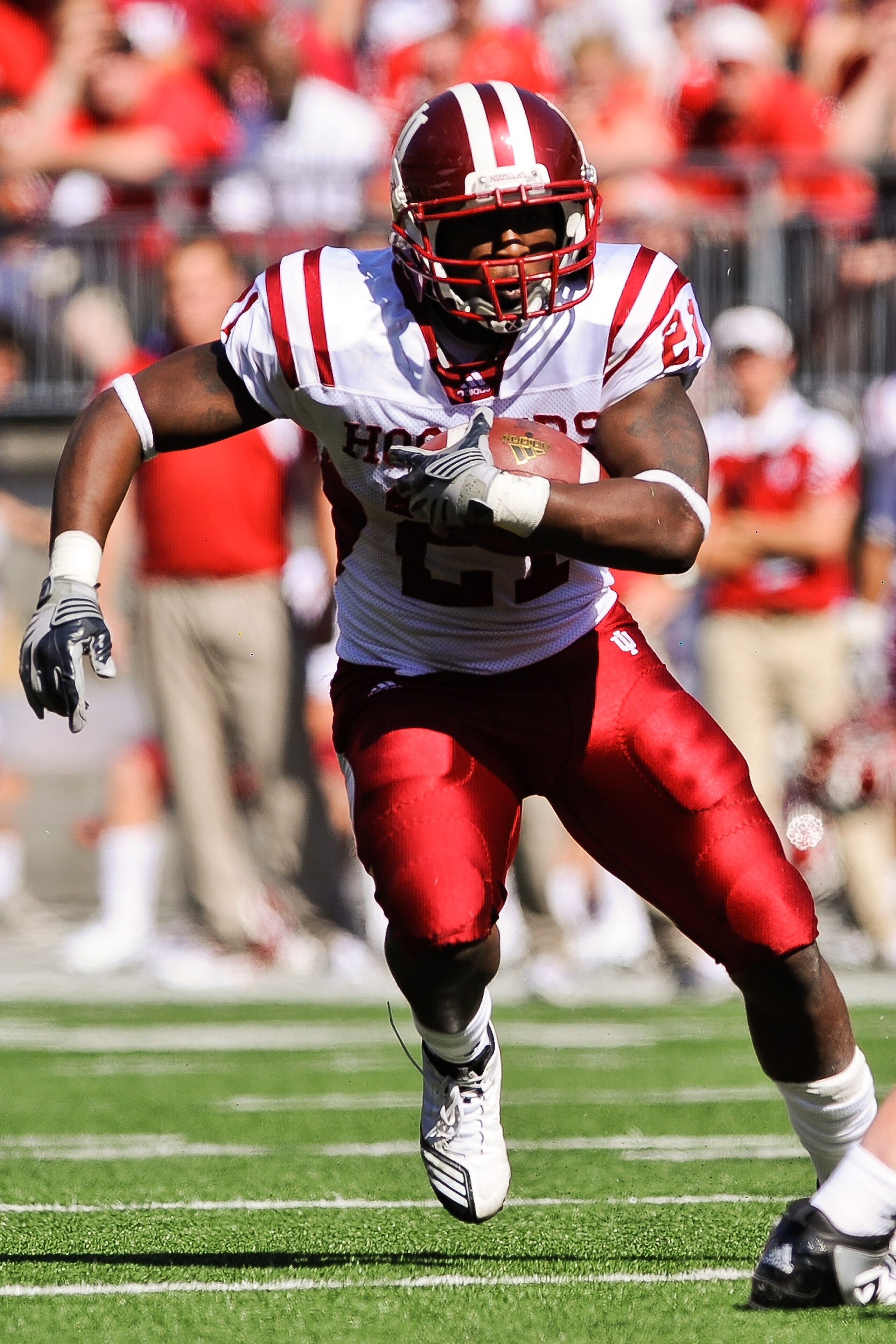 COLUMBUS, OH - OCTOBER 9:  Trea Burgess #21 of the Indiana Hoosiers runs with the ball against the Ohio State Buckeyes at Ohio Stadium on October 9, 2010 in Columbus, Ohio.  (Photo by Jamie Sabau/Getty Images)