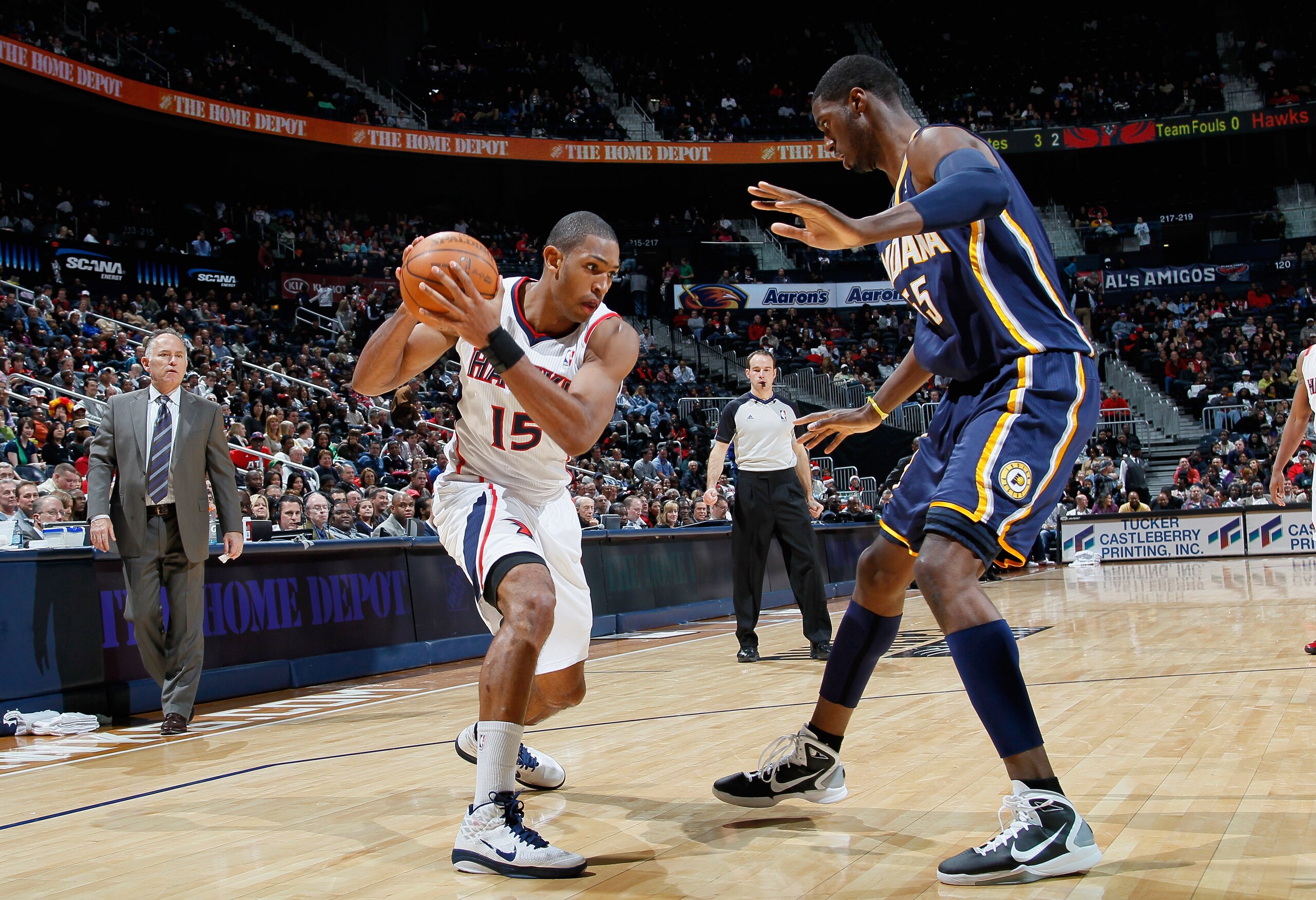 ATLANTA, GA - DECEMBER 11:  Roy Hibbert #55 of the Indiana Pacers against Al Horford #15 of the Atlanta Hawks at Philips Arena on December 11, 2010 in Atlanta, Georgia.  NOTE TO USER: User expressly acknowledges and agrees that, by downloading and/or usin