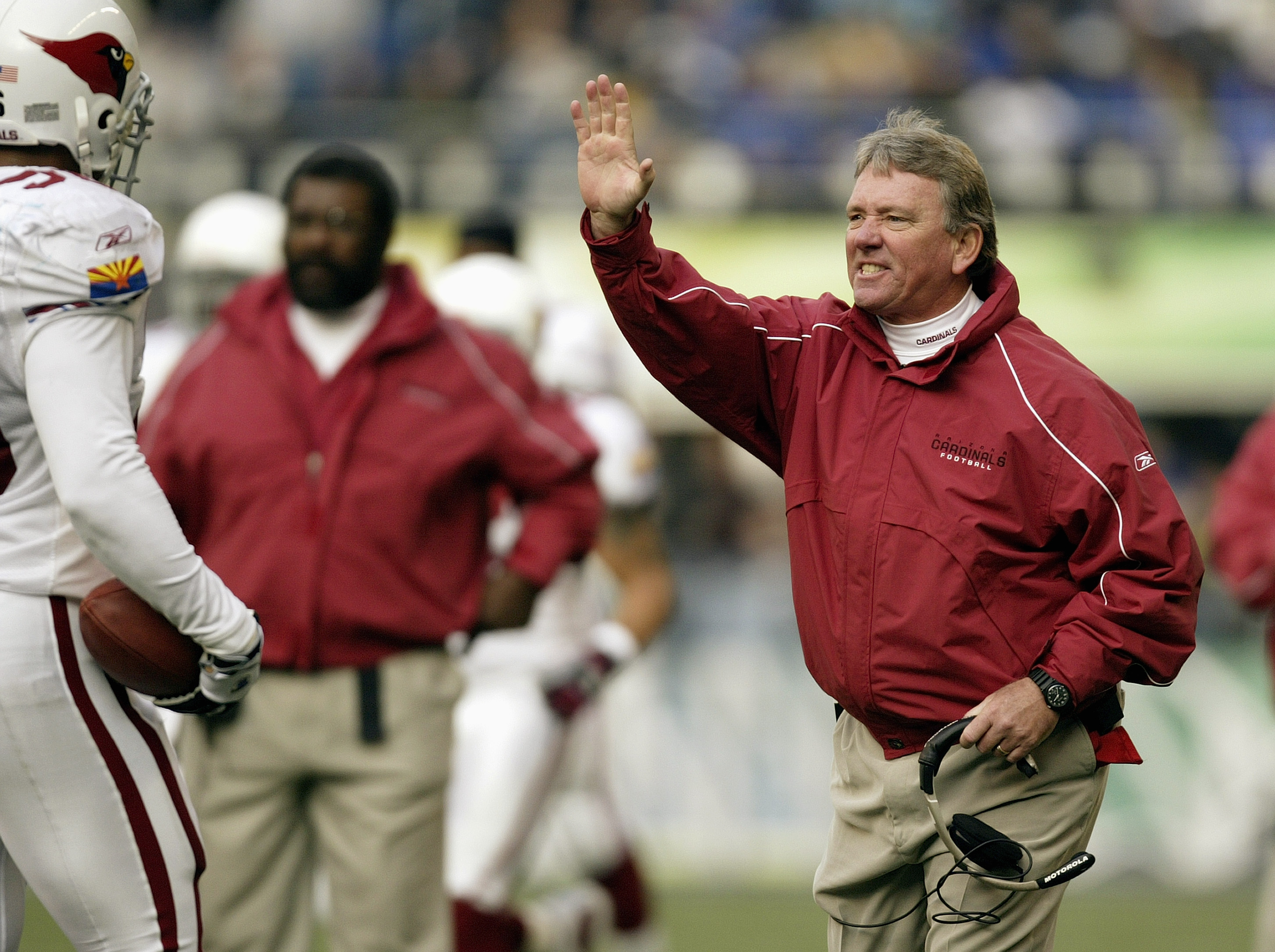 SEATTLE - DECEMBER 21: Head coach Dave McGinnis of the Arizona Cardinals reacts on the sideline during the game against the Seattle Seahawks on December 21 2003 at Seahawks Stadium in Seattle, Washington. The Seahawks defeated the Cardinals 28-10. (Photo