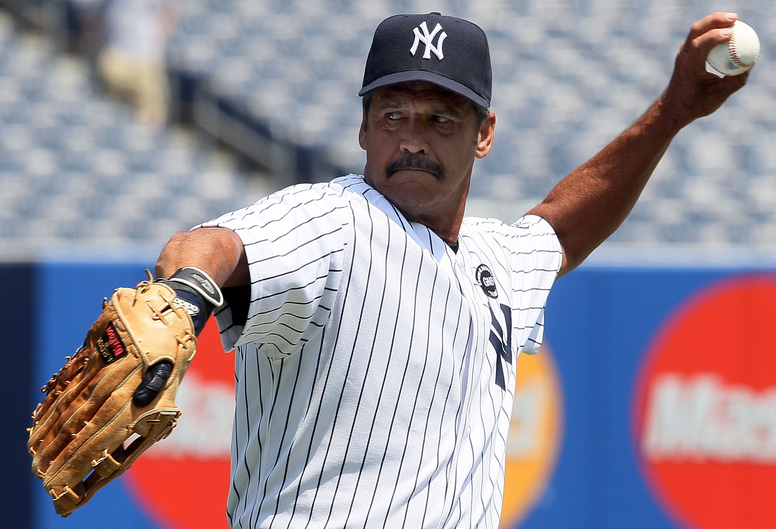 NEW YORK - JULY 17:  Former New York Yankee Ron Guidry warms up before the teams 64th Old-Timer's Day before the MLB game against the Tampa Bay Rays on July 17, 2010 at Yankee Stadium in the Bronx borough of New York City.  (Photo by Jim McIsaac/Getty Ima