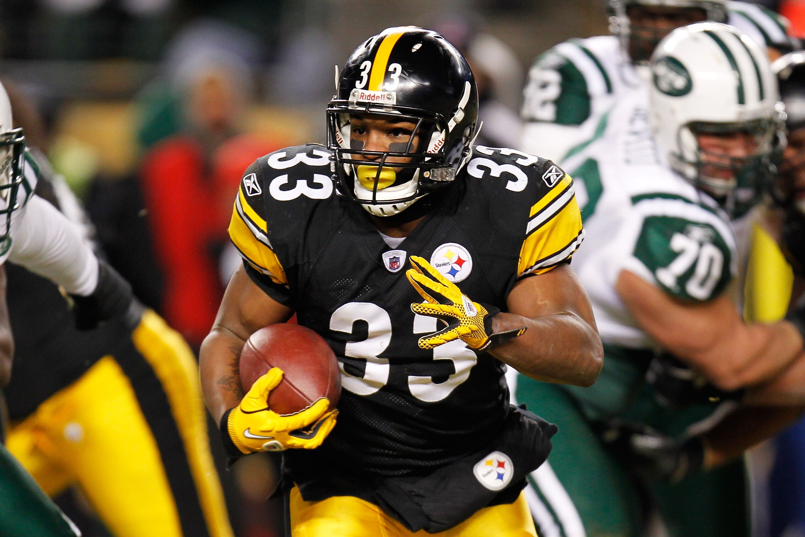 PITTSBURGH, PA - JANUARY 23:  Isaac Redman #33 of the Pittsburgh Steelers runs down field against the New York Jets during the 2011 AFC Championship game at Heinz Field on January 23, 2011 in Pittsburgh, Pennsylvania.  (Photo by Gregory Shamus/Getty Image