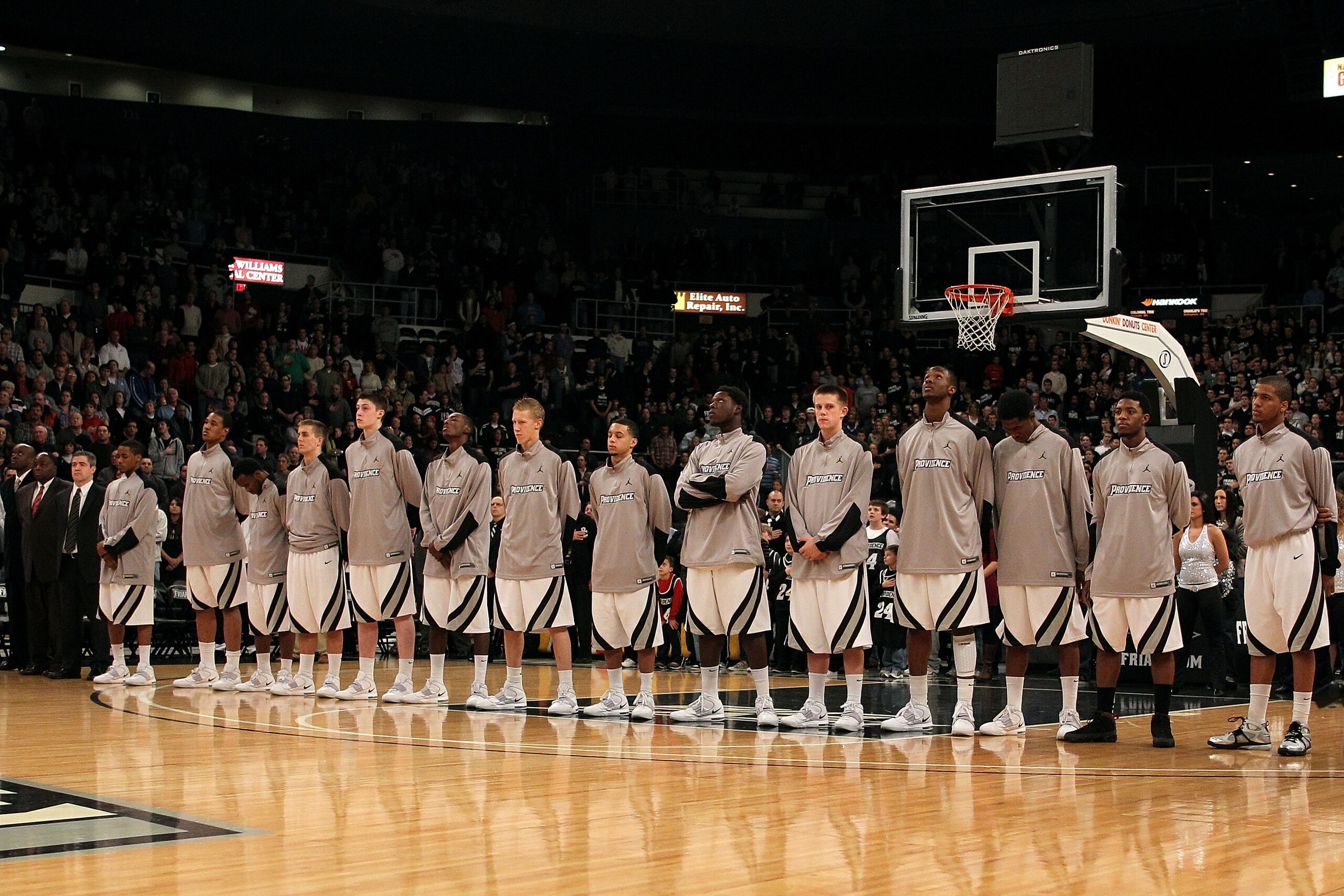 PROVIDENCE, RI - DECEMBER 04:  The Providence Friars stand for the performance of the National Anthem against the Rhode Island Rams at the Dunkin' Donuts Center on December 4, 2010 in Providence, Rhode Island.  (Photo by Chris Chambers/Getty Images)
