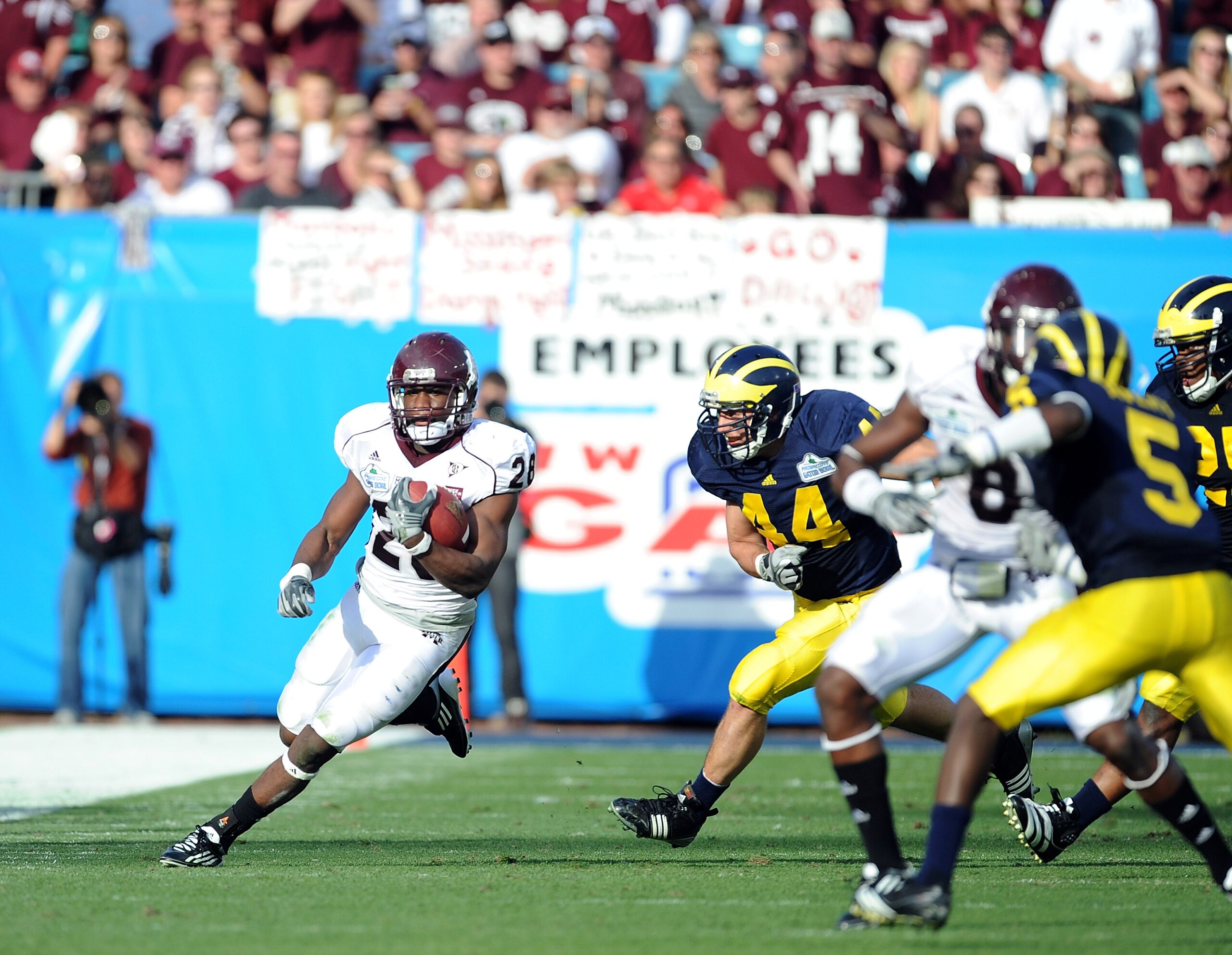 JACKSONVILLE, FL - JANUARY 01:  Running back Vick Ballard #28 of the Mississippi State Bulldogs rushes against the Michigan Wolverines during the Gator Bowl at EverBank Field on January 1, 2011 in Jacksonville, Florida  (Photo by Rick Dole/Getty Images)