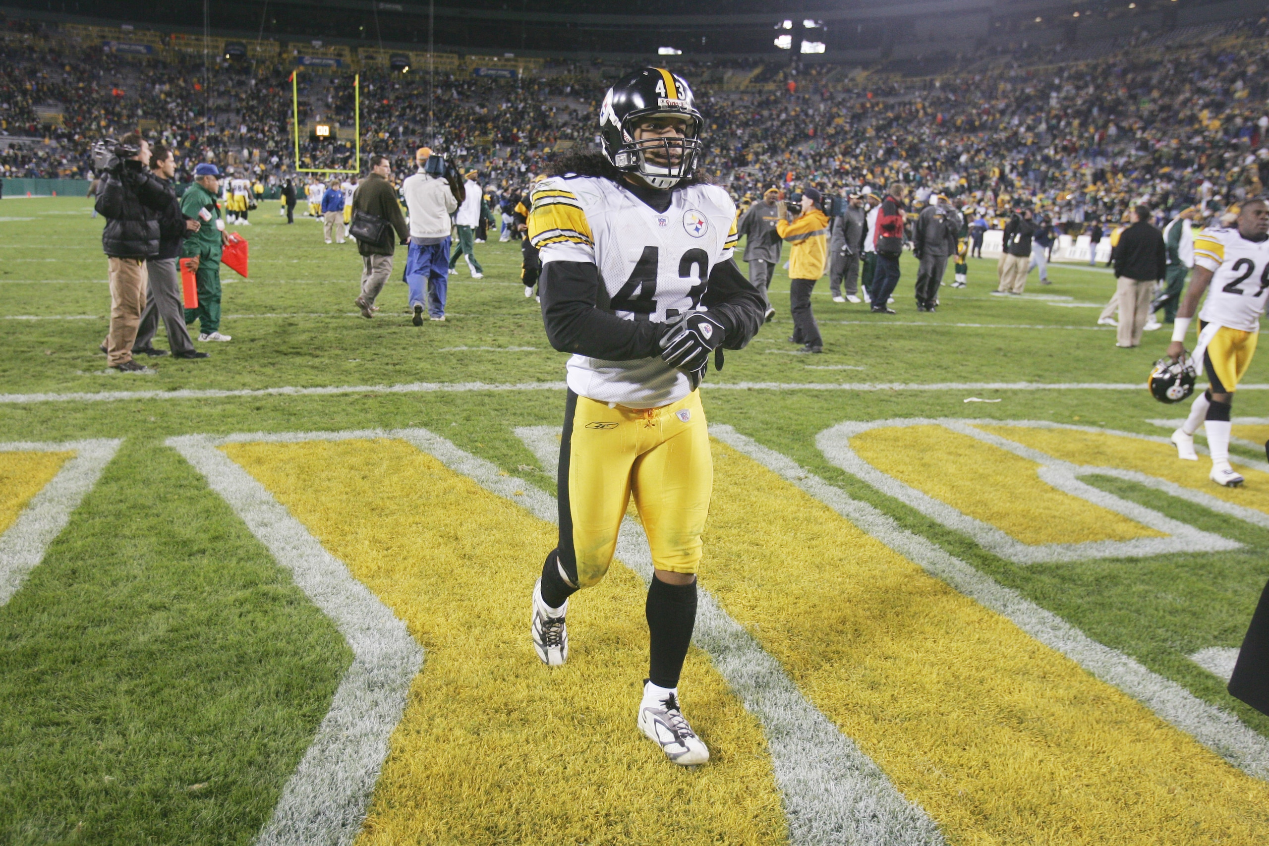 GREEN BAY, WI - NOVEMBER 6: Safety Troy Polamalu #43 of the Pittsburgh Steelers leaves the field following the game against the Green Bay Packers at Lambeau Field on November 6, 2005 in Green Bay, Wisconsin. The Steelers defeated the Packers 20-10. (Pho GREEN BAY, WI - NOVEMBER 6: Safety Troy Polamalu #43 of the Pittsburgh Steelers leaves the field following the game against the Green Bay Packers at Lambeau Field on November 6, 2005 in Green Bay, Wisconsin. The Steelers defeated the Packers 20-10. (Pho