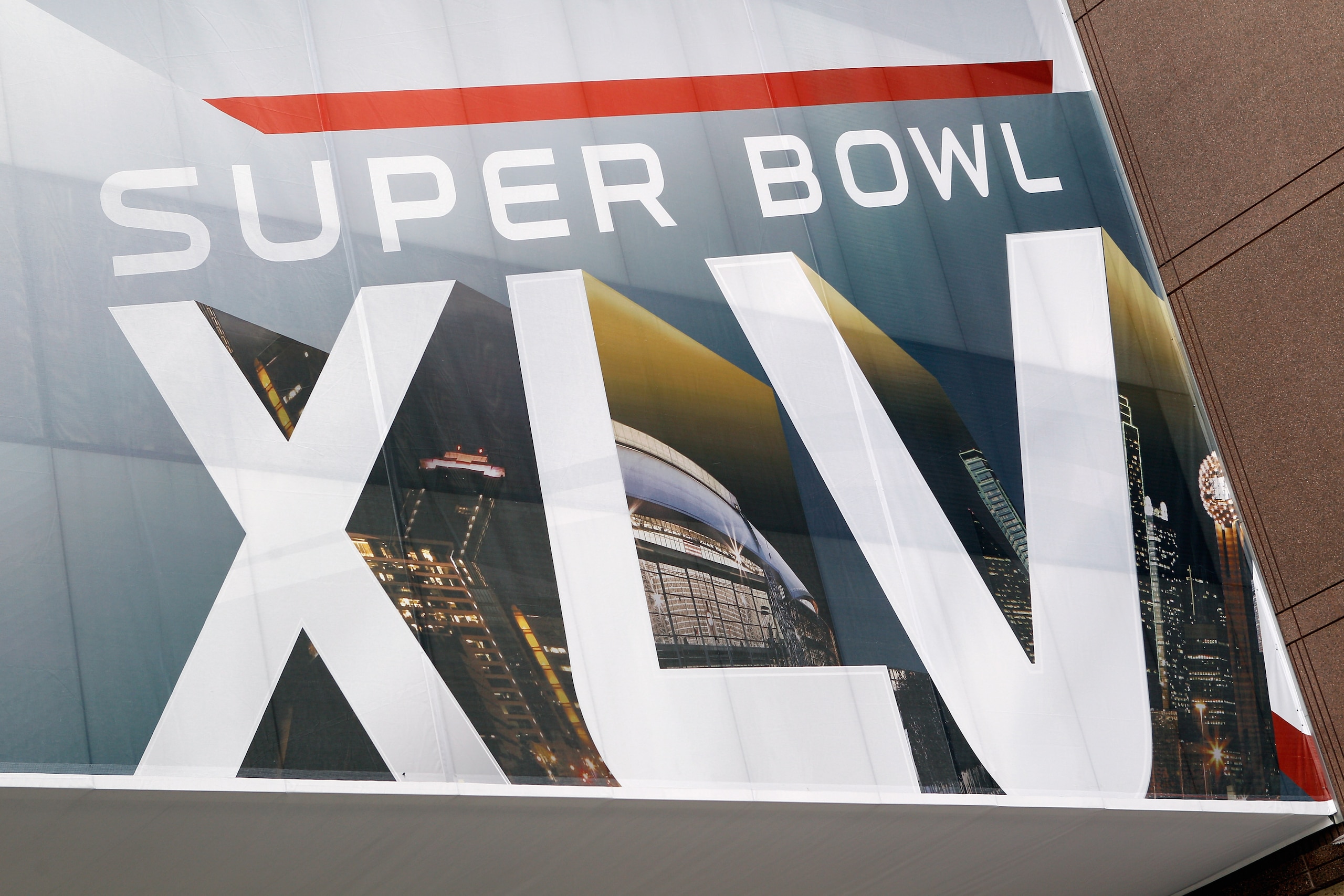 DALLAS, TX - FEBRUARY 02:  A Super Bowl XLV banner is displayed downtown on February 2, 2011 in Dallas, Texas. The Green Bay Packers will play the Pittsburgh Steelers in Super Bowl XLV on February 6, 2011 at Cowboys Stadium in Arlington, Texas.  (Photo by