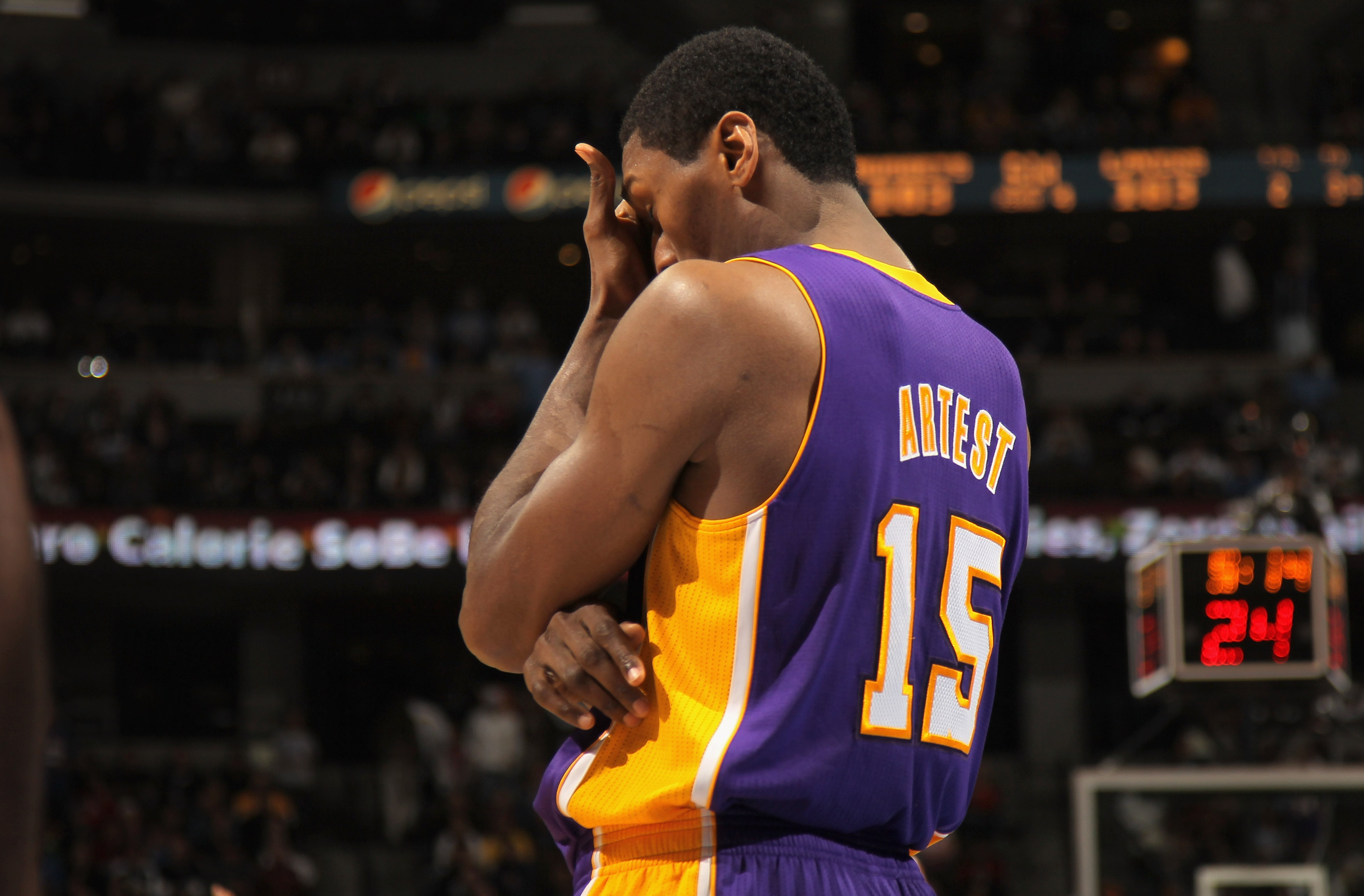 DENVER - NOVEMBER 11:  Ron Artest #15 of the Los Angeles Lakers reacts after being called for a foul against the Denver Nuggets at the Pepsi Center on November 11, 2010 in Denver, Colorado. The Nuggets defeated the Lakers 118-112.  NOTE TO USER: User expr