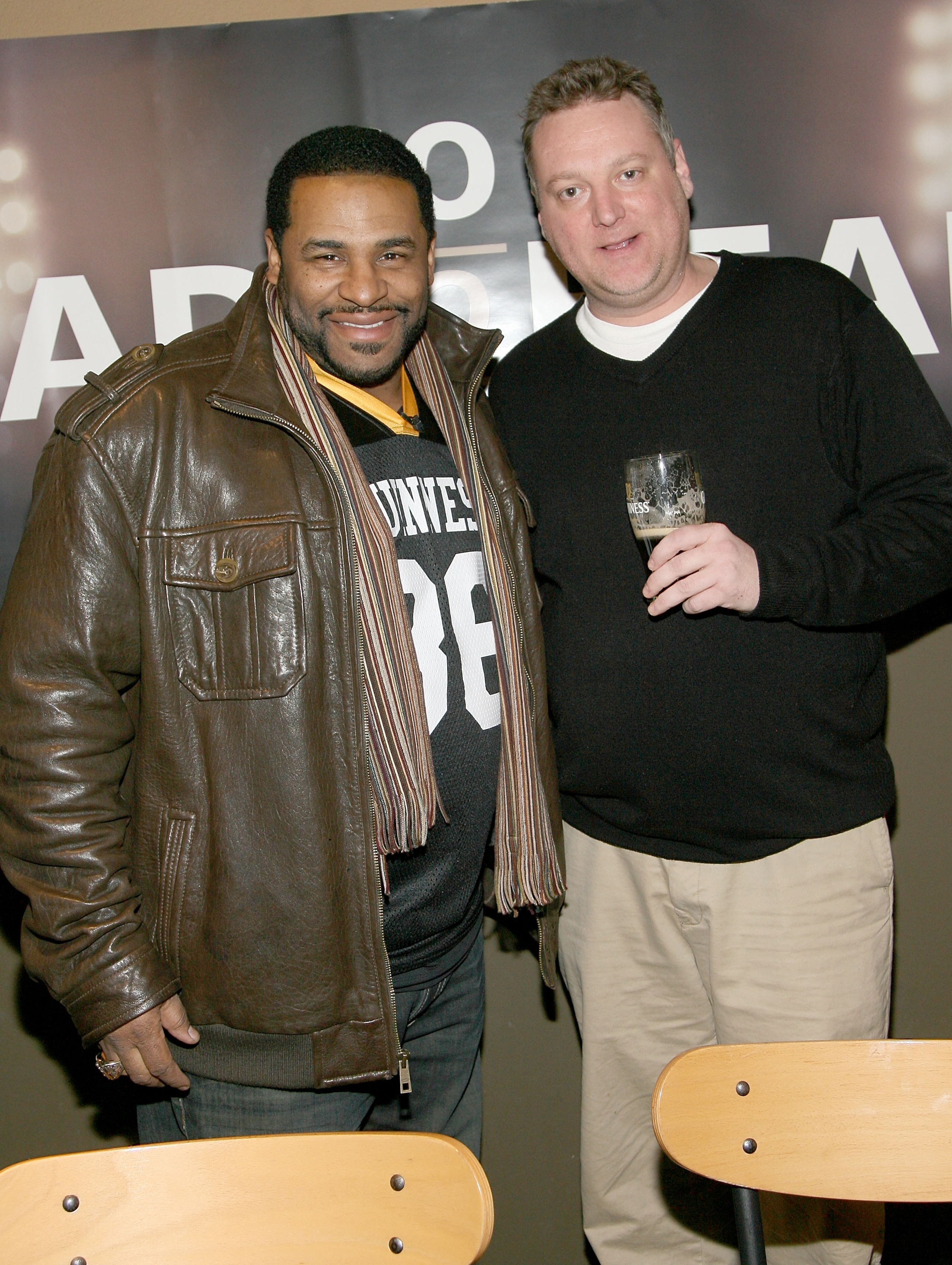 ARLINGTON, TX - FEBRUARY 03:  Former NFL player Jerome Bettis (Left) competes in the Guinness Perfect Pint Pour-Off at Buffalo Wild Wings on February 3, 2011 in Arlington, Texas.  (Photo by Maury Phillips/Getty Images for Guinness)