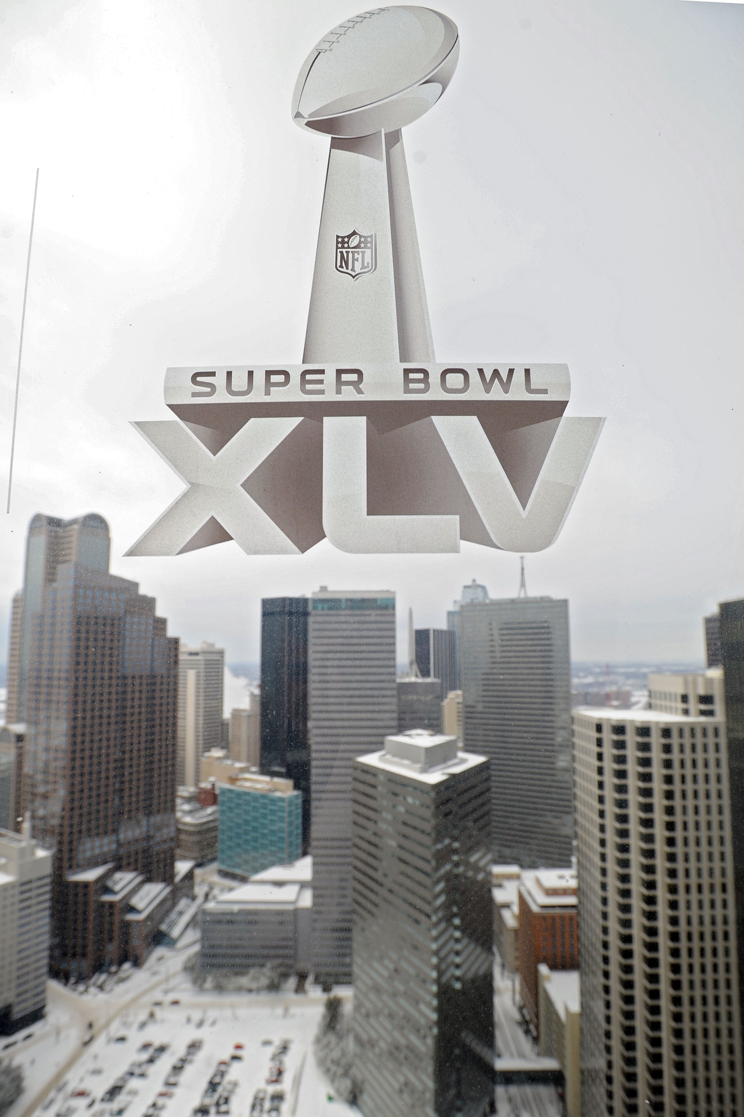 DALLAS, TX - FEBRUARY 04:  A Super Bowl XLV sticker is seen on a window over looking downtown Dallas on February 4, 2011 in Dallas, Texas. More than four inches of snow fell overnight in the North Texas area. The Green Bay Packers will play the Pittsburgh
