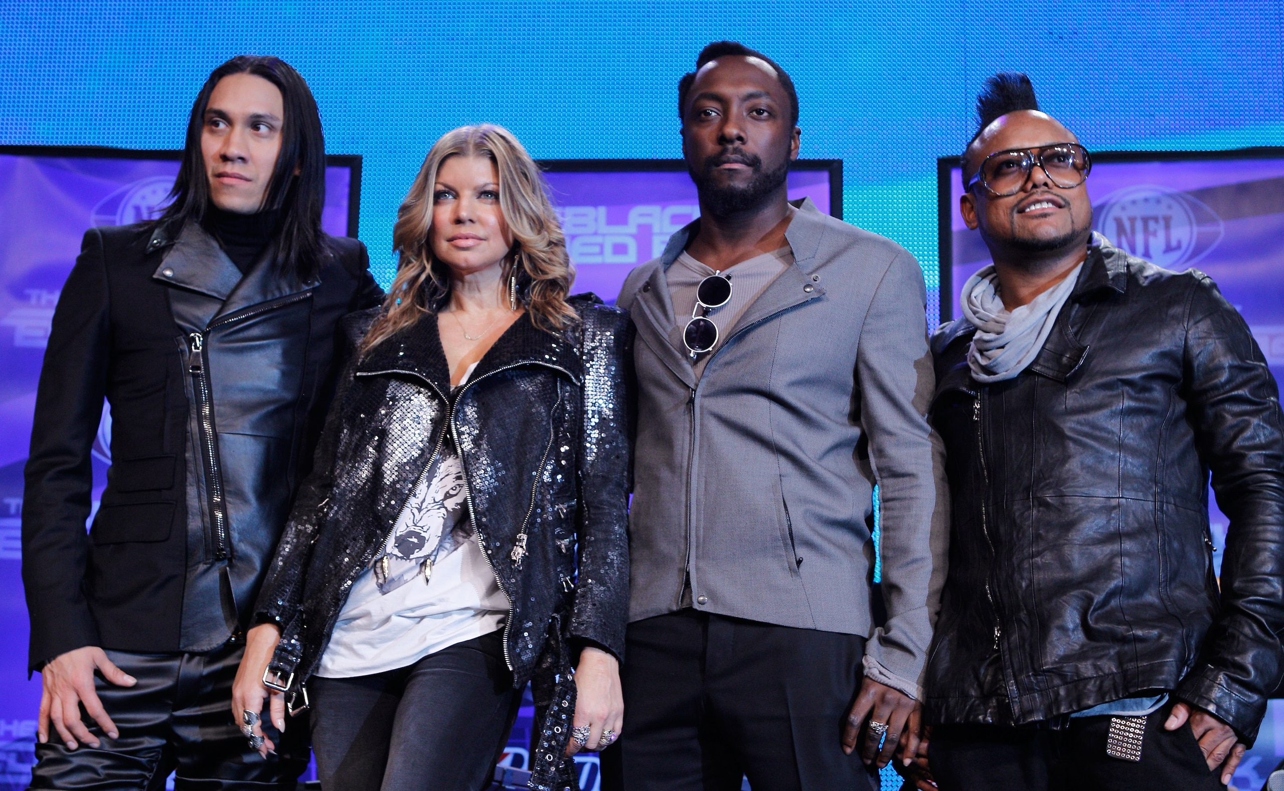DALLAS, TX - FEBRUARY 03:  (L-R) Taboo, Fergie, will.i.am and apl.de.ap of the Black Eyed Peas attend a press conference at the Super Bowl XLV media center on February 3, 2011 in Dallas, Texas. The Black Eyed Peas will perform during the Bridgestone Super