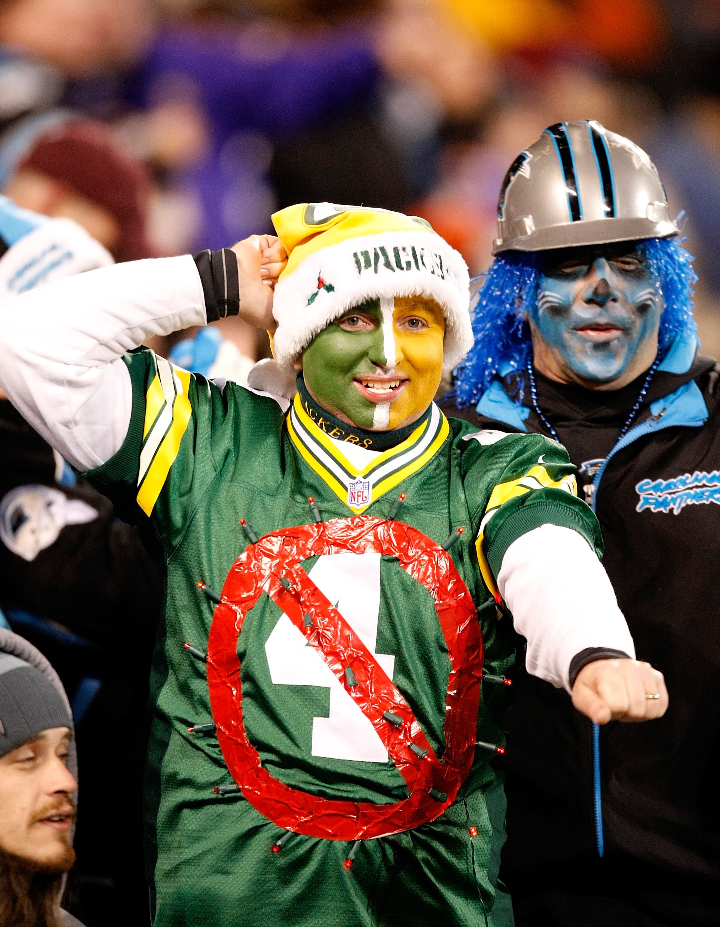 CHARLOTTE, NC - DECEMBER 20:  A Green Bay Packers fan wears an old jersey of quarterback Brett Favre (not pictured) #4 of the Minnesota Vikings during the game against the Carolina Panthers at Bank of America Stadium on December 20, 2009 in Charlotte, Nor