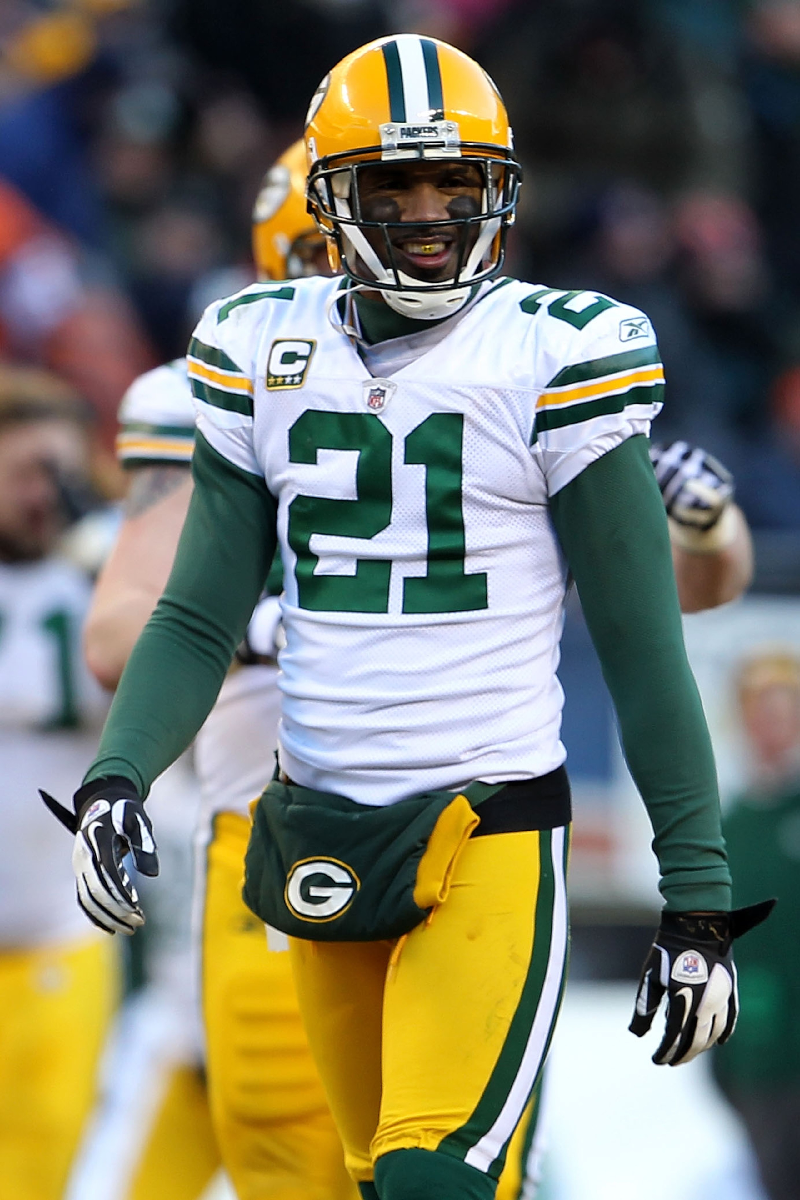 CHICAGO, IL - JANUARY 23: Charles Woodson #21 of the Green Bay Packers smiles while taking on the Chicago Bears in the NFC Championship Game at Soldier Field on January 23, 2011 in Chicago, Illinois. (Photo by Jamie Squire/Getty Images) CHICAGO, IL - JANUARY 23: Charles Woodson #21 of the Green Bay Packers smiles while taking on the Chicago Bears in the NFC Championship Game at Soldier Field on January 23, 2011 in Chicago, Illinois. (Photo by Jamie Squire/Getty Images)