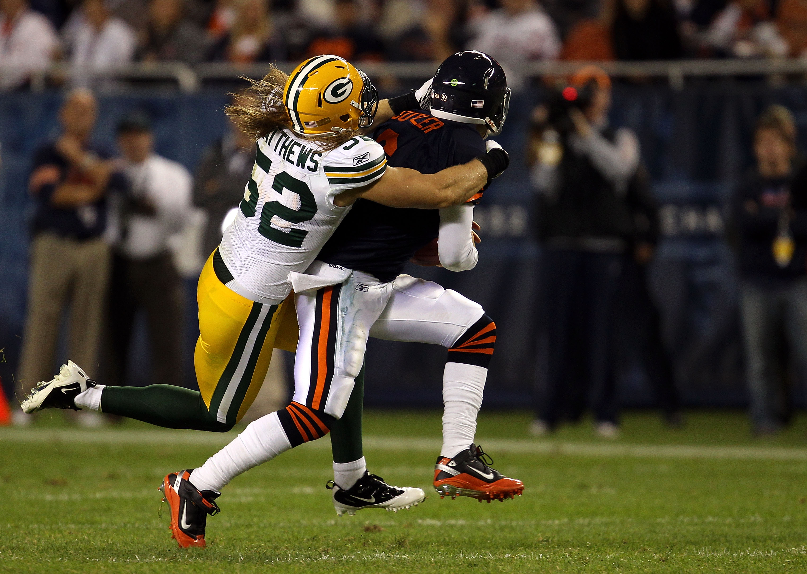 CHICAGO - SEPTEMBER 27:  Clay Matthews #52 of the Green Bay Packers is called for a facemask as he pulls down Jay Cutler #6 of the Chicago Bears in the first quarter at Soldier Field on September 27, 2010 in Chicago, Illinois. The Bears won 20-17. (Photo
