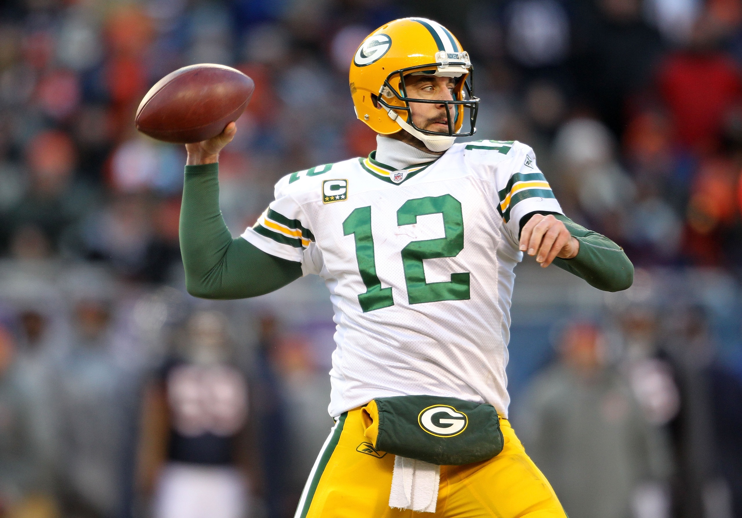 CHICAGO, IL - JANUARY 23: Quarterback Aaron Rodgers #12 of the Green Bay Packers throws a pass in the second half against the Chicago Bears in the NFC Championship Game at Soldier Field on January 23, 2011 in Chicago, Illinois. (Photo by Andy Lyons/Gett CHICAGO, IL - JANUARY 23: Quarterback Aaron Rodgers #12 of the Green Bay Packers throws a pass in the second half against the Chicago Bears in the NFC Championship Game at Soldier Field on January 23, 2011 in Chicago, Illinois. (Photo by Andy Lyons/Gett