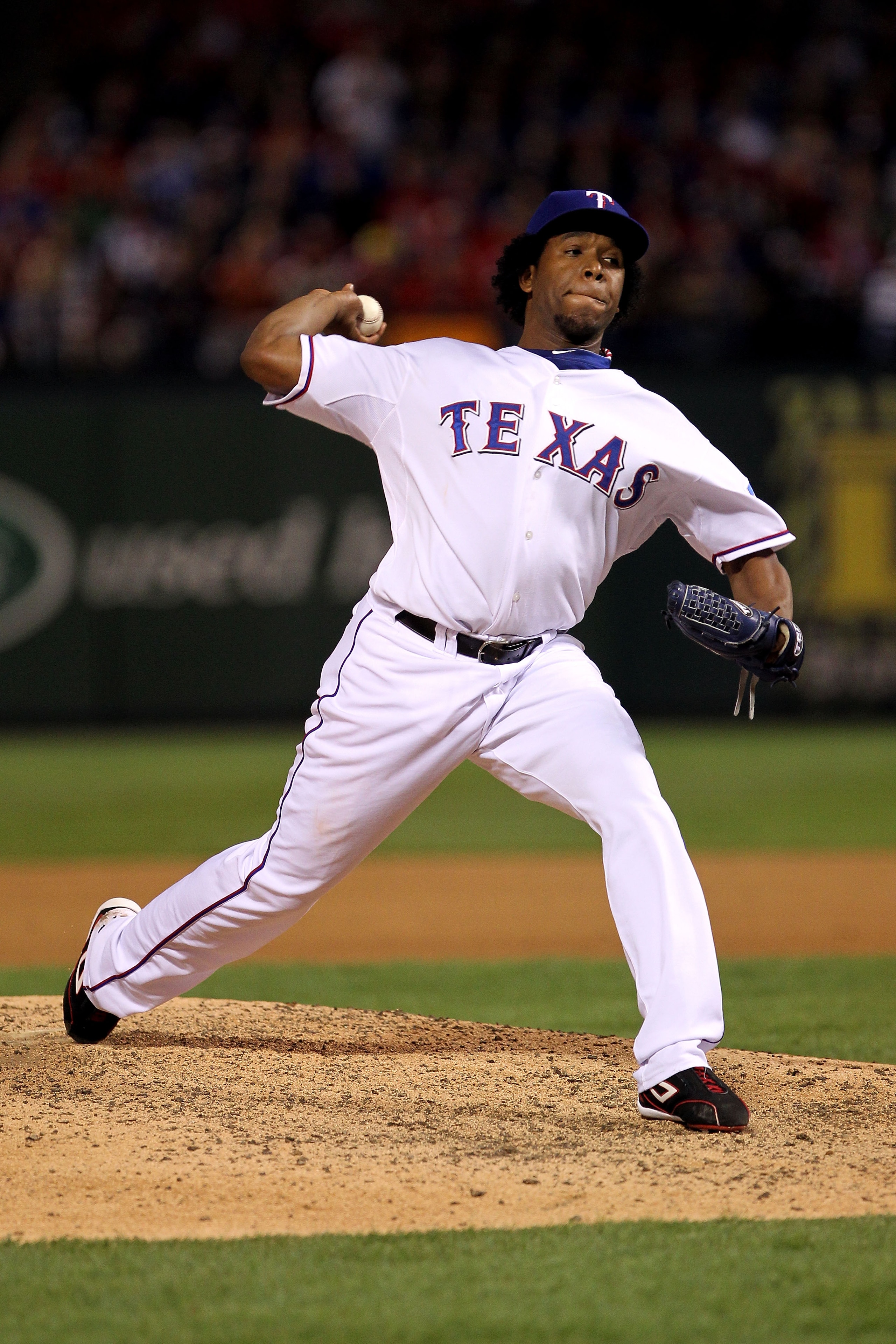 ARLINGTON, TX - NOVEMBER 01:  Neftali Feliz #30 of the Texas Rangers pitches against the San Francisco Giants in Game Five of the 2010 MLB World Series at Rangers Ballpark in Arlington on November 1, 2010 in Arlington, Texas. The Giants won 3-1.  (Photo b