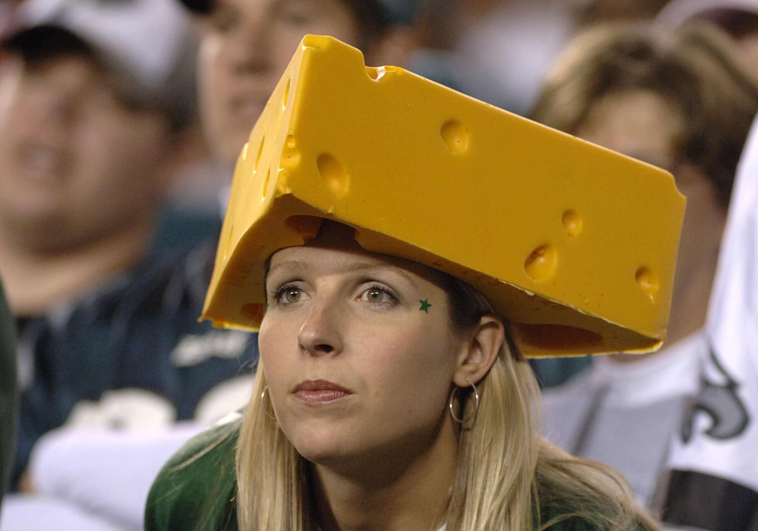 Green Bay Packers cheesehead watches play play against the Philadelphia Eagles Oct. 2. 2006 on ESPN Monday Night Football in Philadelphia. (Photo by Al Messerschmidt/Getty Images) Green Bay Packers cheesehead watches play play against the Philadelphia Eagles Oct. 2. 2006 on ESPN Monday Night Football in Philadelphia. (Photo by Al Messerschmidt/Getty Images)
