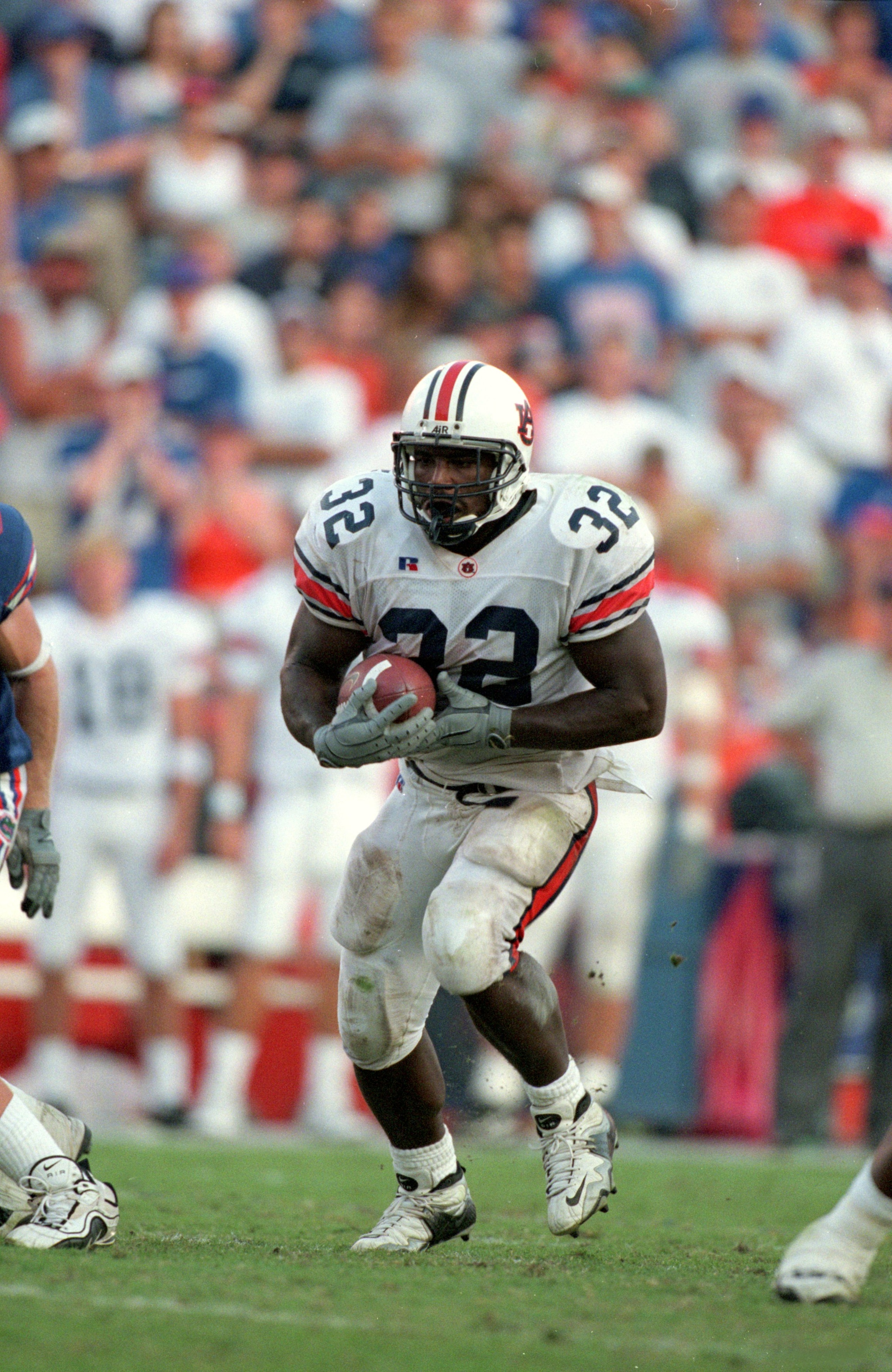 14 Oct 2000: Rudi Johnson #32 of the Auburn Tigers runs with the ball during the game against the Florida Gators at the Ben Hill Griffin Stadium in Gainsville, Florida. The Gators defeated the Tigers 28-7.Mandatory Credit: Scott Halleran /Allsport 14 Oct 2000: Rudi Johnson #32 of the Auburn Tigers runs with the ball during the game against the Florida Gators at the Ben Hill Griffin Stadium in Gainsville, Florida. The Gators defeated the Tigers 28-7.Mandatory Credit: Scott Halleran /Allsport