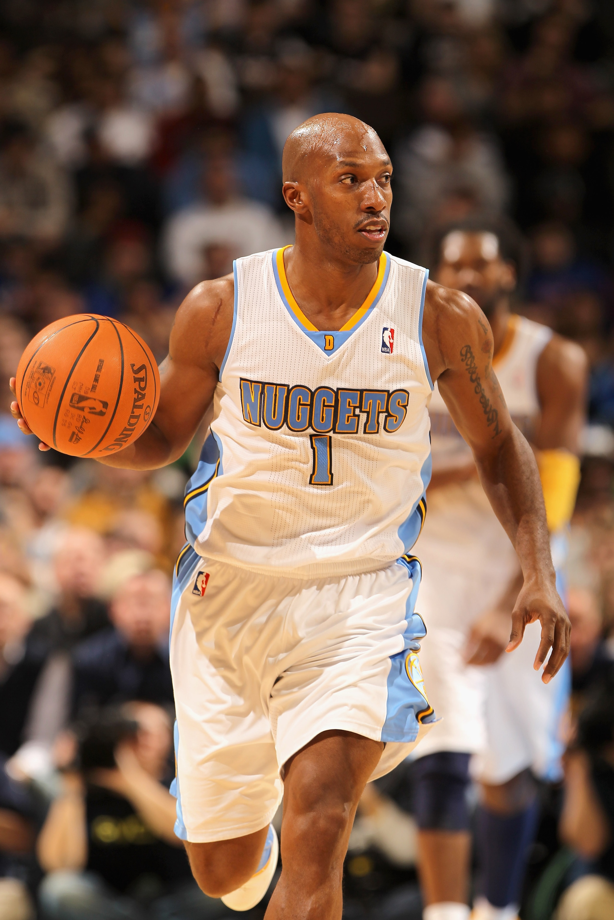 DENVER, CO - JANUARY 13:  Chauncey Billups #1 of the Denver Nuggets dribbles the ball upcourt against the Miami Heat at the Pepsi Center on January 13, 2011 in Denver, Colorado. The Nuggets defeated the Heat 130-102. NOTE TO USER: User expressly acknowled