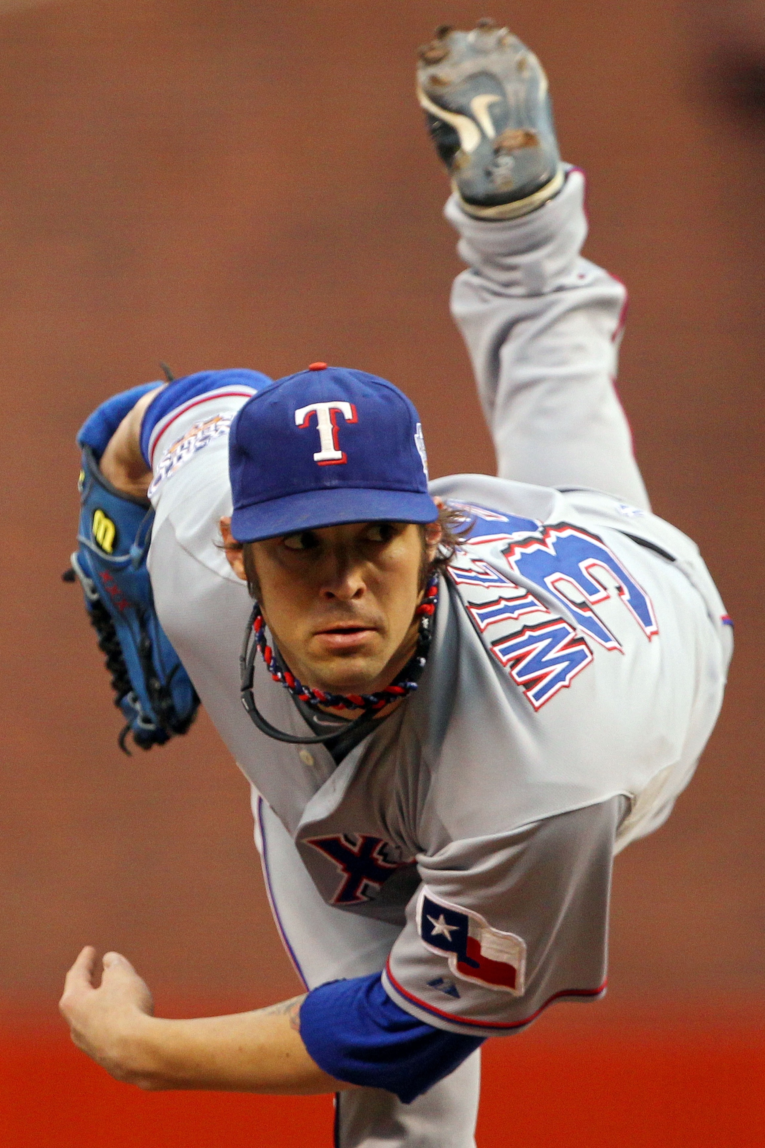 SAN FRANCISCO - OCTOBER 28:  Starting pitcher C.J. Wilson #36 of the Texas Rangers pitches against the San Francisco Giants in Game Two of the 2010 MLB World Series at AT&T Park on October 28, 2010 in San Francisco, California.  (Photo by Doug Pensinger/G