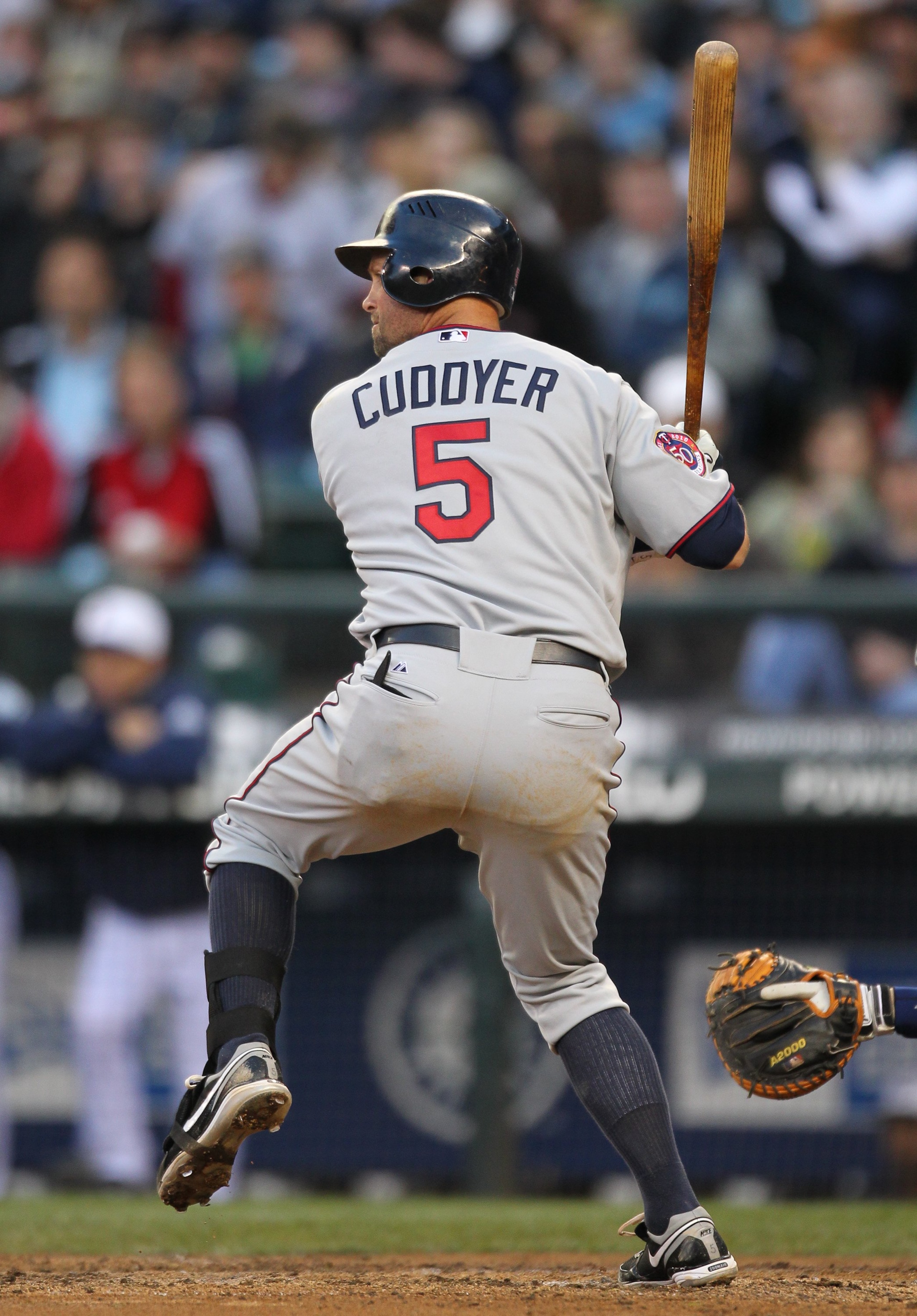 SEATTLE - MAY 31:  Michael Cuddyer #5 of the Minnesota Twins bats against the Seattle Mariners at Safeco Field on May 31, 2010 in Seattle, Washington. (Photo by Otto Greule Jr/Getty Images)