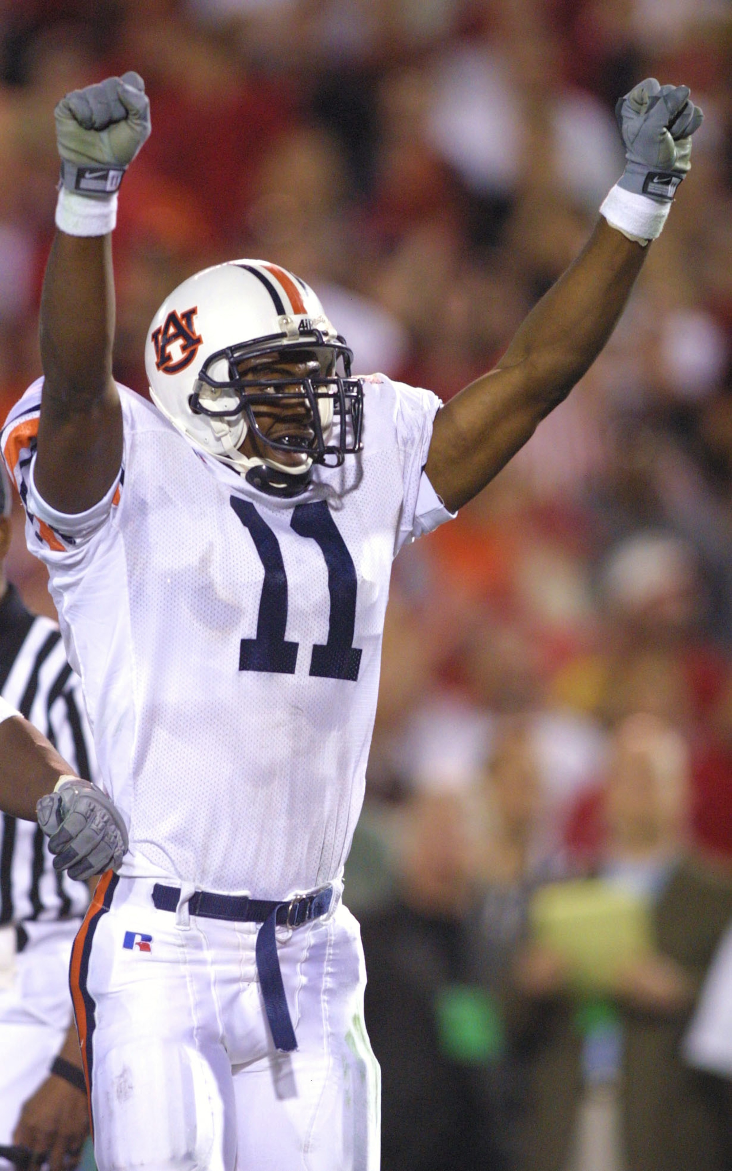 10 NOV 2001: Defender Karlos Dansby #11 of Auburn celebrates after the Tigers defeated the Georgia Bulldogs 24-17 at Sanford Stadium in Athens, Georgia DIGITAL IMAGE. Mandatory Credit: Scott Halleran/ALLSPORT 10 NOV 2001: Defender Karlos Dansby #11 of Auburn celebrates after the Tigers defeated the Georgia Bulldogs 24-17 at Sanford Stadium in Athens, Georgia DIGITAL IMAGE. Mandatory Credit: Scott Halleran/ALLSPORT
