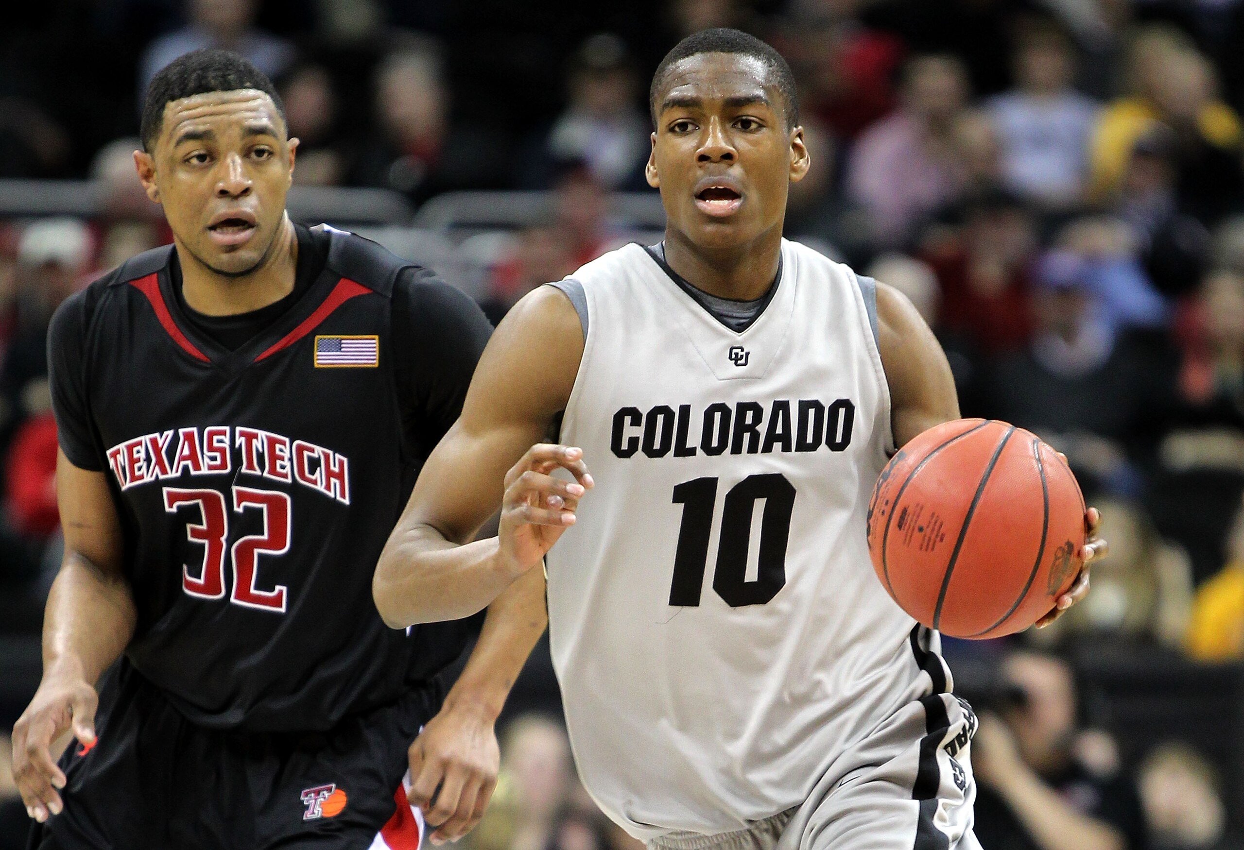 KANSAS CITY, MO - MARCH 10: Alec Burks #10 of the Colorado Buffaloes moves the ball against Mike Singletary #32 of the Texas Tech Red Raiders in the first half during the first round game of the 2010 Phillips 66 Big 12 Men's Basketball Tournament at the KANSAS CITY, MO - MARCH 10: Alec Burks #10 of the Colorado Buffaloes moves the ball against Mike Singletary #32 of the Texas Tech Red Raiders in the first half during the first round game of the 2010 Phillips 66 Big 12 Men's Basketball Tournament at the