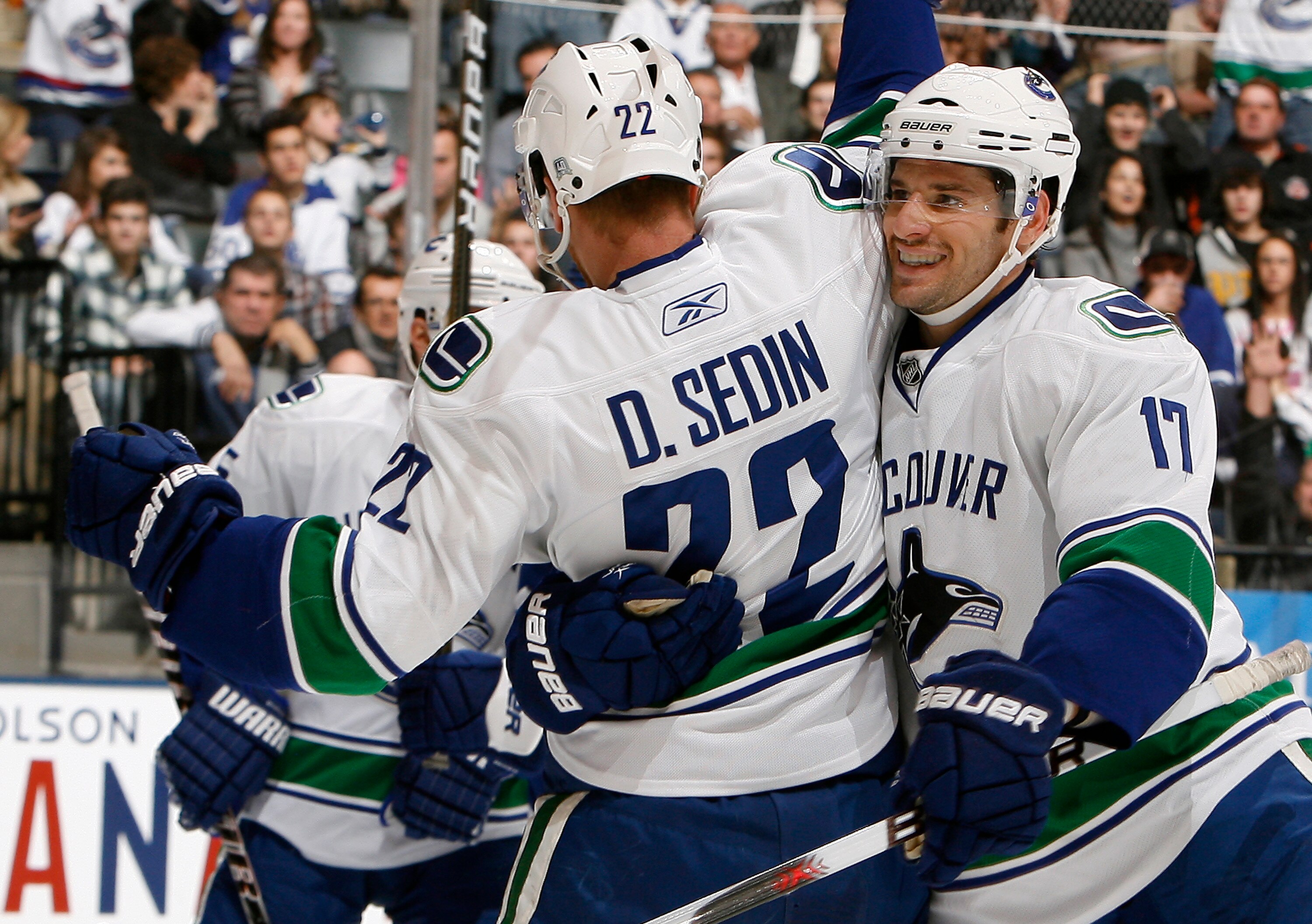 TORONTO - NOVEMBER 13: Daniel Sedin #22 and Ryan Kesler #17 of the Vancouver Canucks celebrate Ryan Kesler goal during game action against the Toronto Maple Leafs at the Air Canada Centre November 13, 2010 in Toronto, Ontario, Canada. (Photo by Abelimages