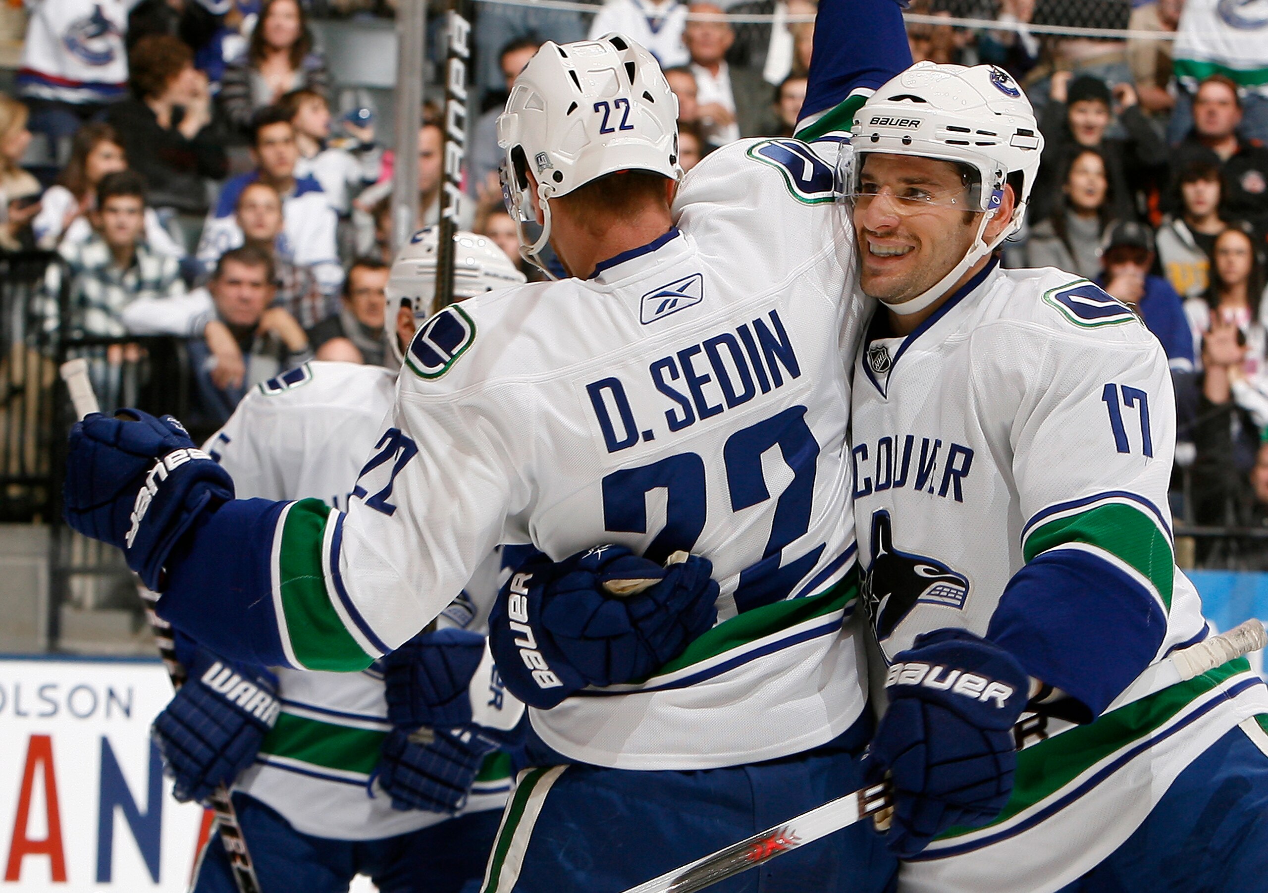 TORONTO - NOVEMBER 13: Daniel Sedin #22 and Ryan Kesler #17 of the Vancouver Canucks celebrate Ryan Kesler goal during game action against the Toronto Maple Leafs at the Air Canada Centre November 13, 2010 in Toronto, Ontario, Canada. (Photo by Abelimages