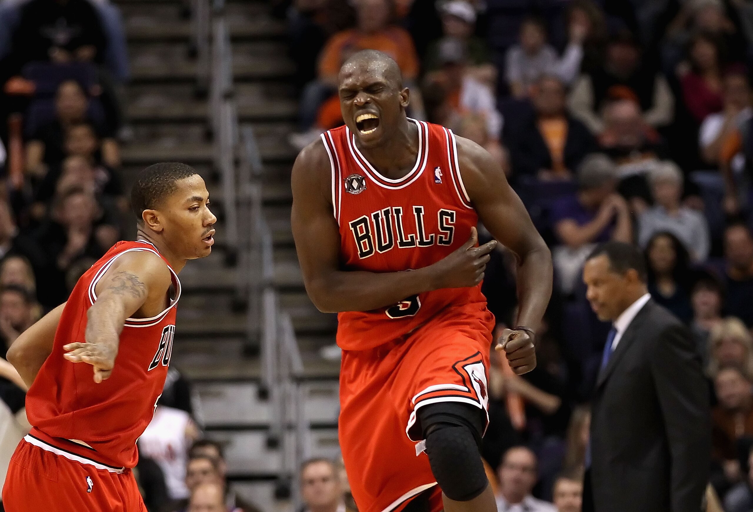 PHOENIX - NOVEMBER 24:  Luol Deng #9 of the Chicago Bulls celebrates after scoring against the Phoenix Suns late in overtime of the NBA game at US Airways Center on November 24, 2010 in Phoenix, Arizona. The Bulls defeated the Suns 123-115 in double overt