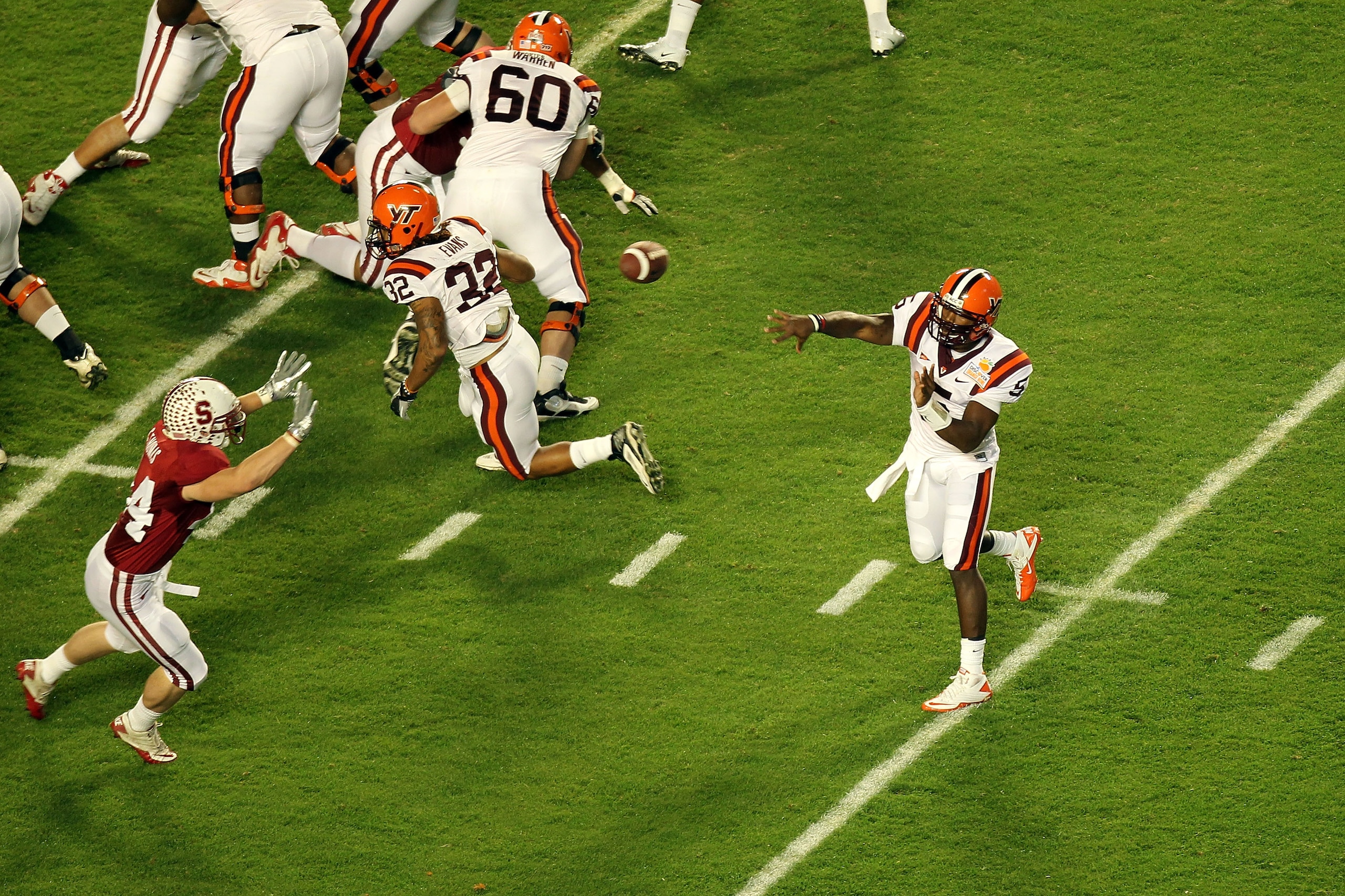 MIAMI, FL - JANUARY 03:  Tyrod Taylor #5 of the Virginia Tech Hokies throws a pass against the Stanford Cardinal during the 2011 Discover Orange Bowl at Sun Life Stadium on January 3, 2011 in Miami, Florida. Stanford won 40-12.  (Photo by Mike Ehrmann/Get