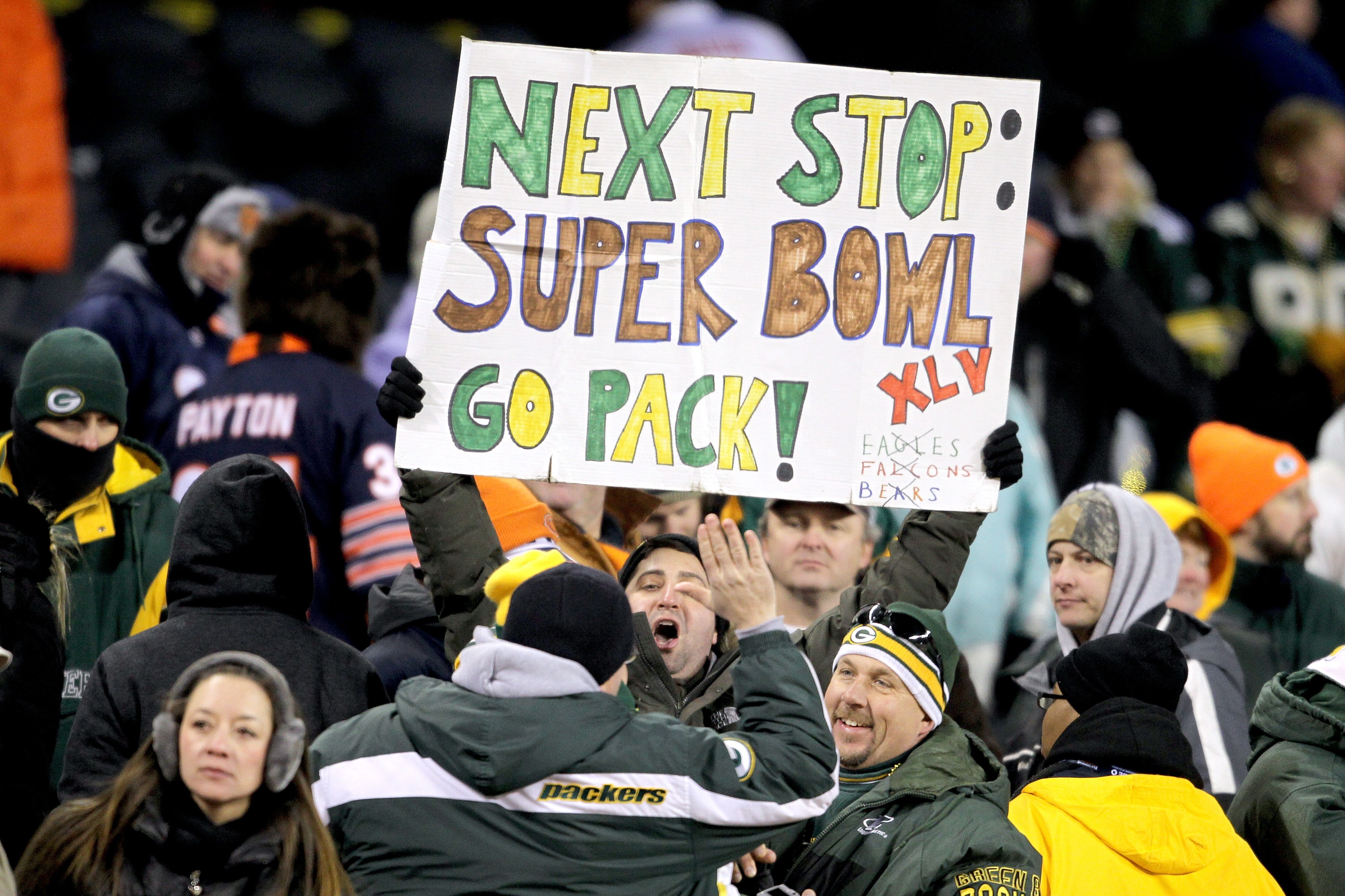 CHICAGO, IL - JANUARY 23:  Green Bay Packers fans hold up a Super Bowl sign after the Packers 21-14 victory against the Chicago Bears in the NFC Championship Game at Soldier Field on January 23, 2011 in Chicago, Illinois.  (Photo by Andy Lyons/Getty Image