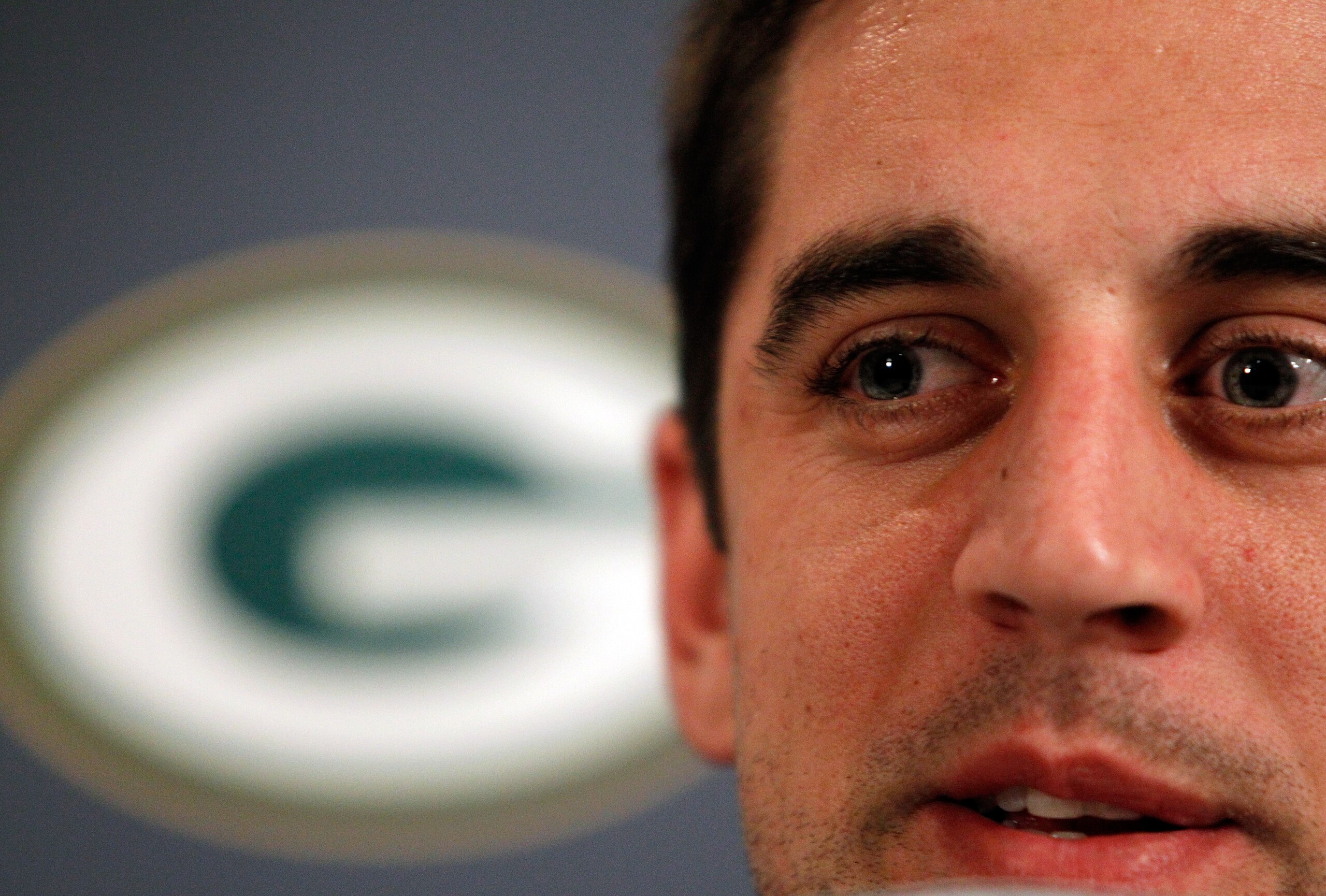 IRVING, TX - JANUARY 31:  Quarterback Aaron Rodgers #12 of the Green Bay Packers talks to the media on January 31, 2011 in Irving, Texas. The Green Bay Packers will play the Pittsburgh Steelers in Super Bowl XLV on February 6, 2011 at Cowboys Stadium in A