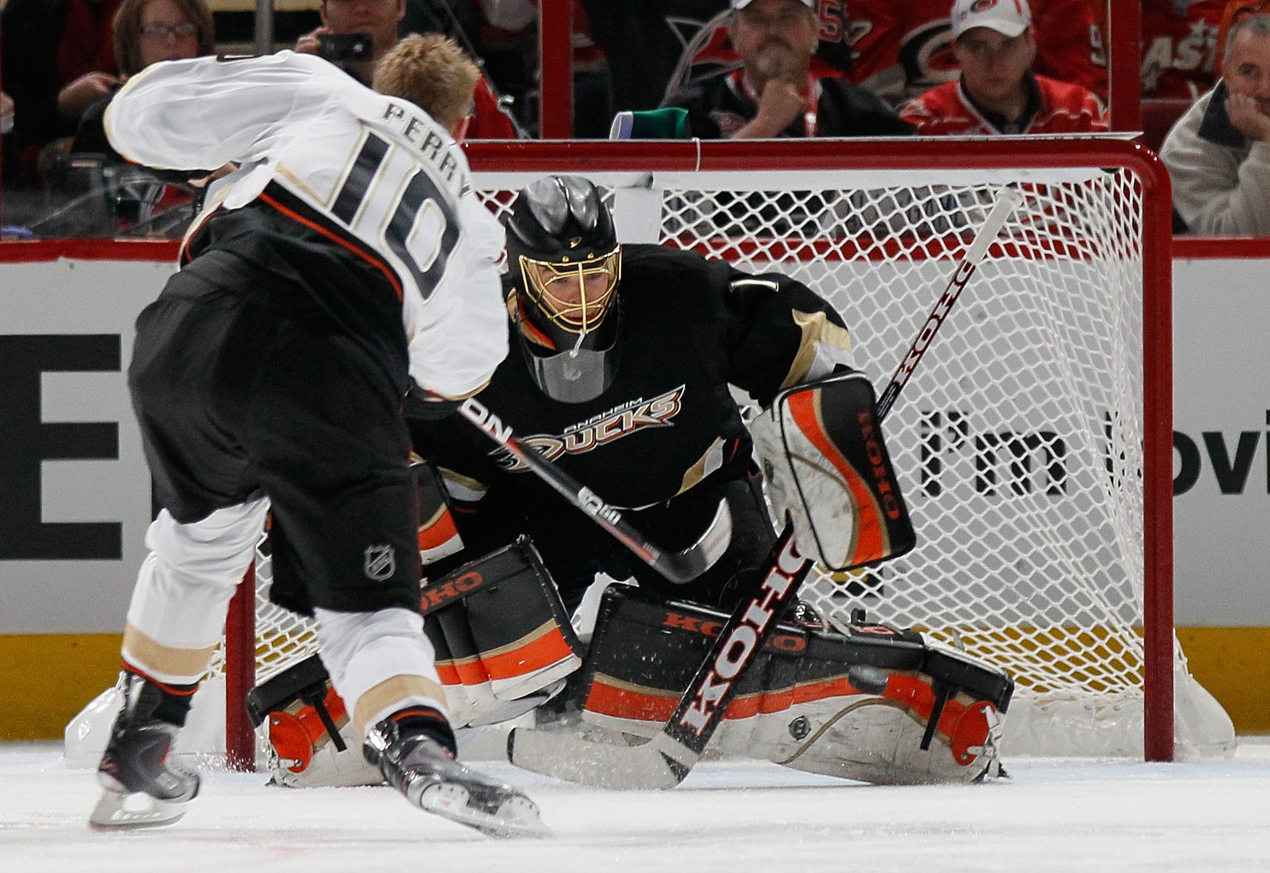 RALEIGH, NC - JANUARY 29: Corey Perry #10 of the Anaheim Ducks shoots against Jonas Hiller #1 of the Anaheim Ducks during the elimination shootout part of the Honda NHL SuperSkills competition part of 2011 NHL All-Star Weekend at the RBC Center on January